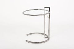 Runder beistelltisch aus glas und chrom von Eileen Gray (attr.)