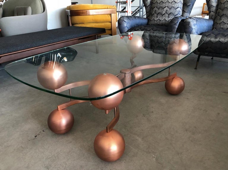 MidCentury Glass Coffee Table with Sculptural Copper Frame For Sale at