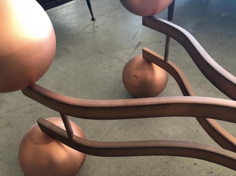 MidCentury Glass Coffee Table with Sculptural Copper Frame For Sale at