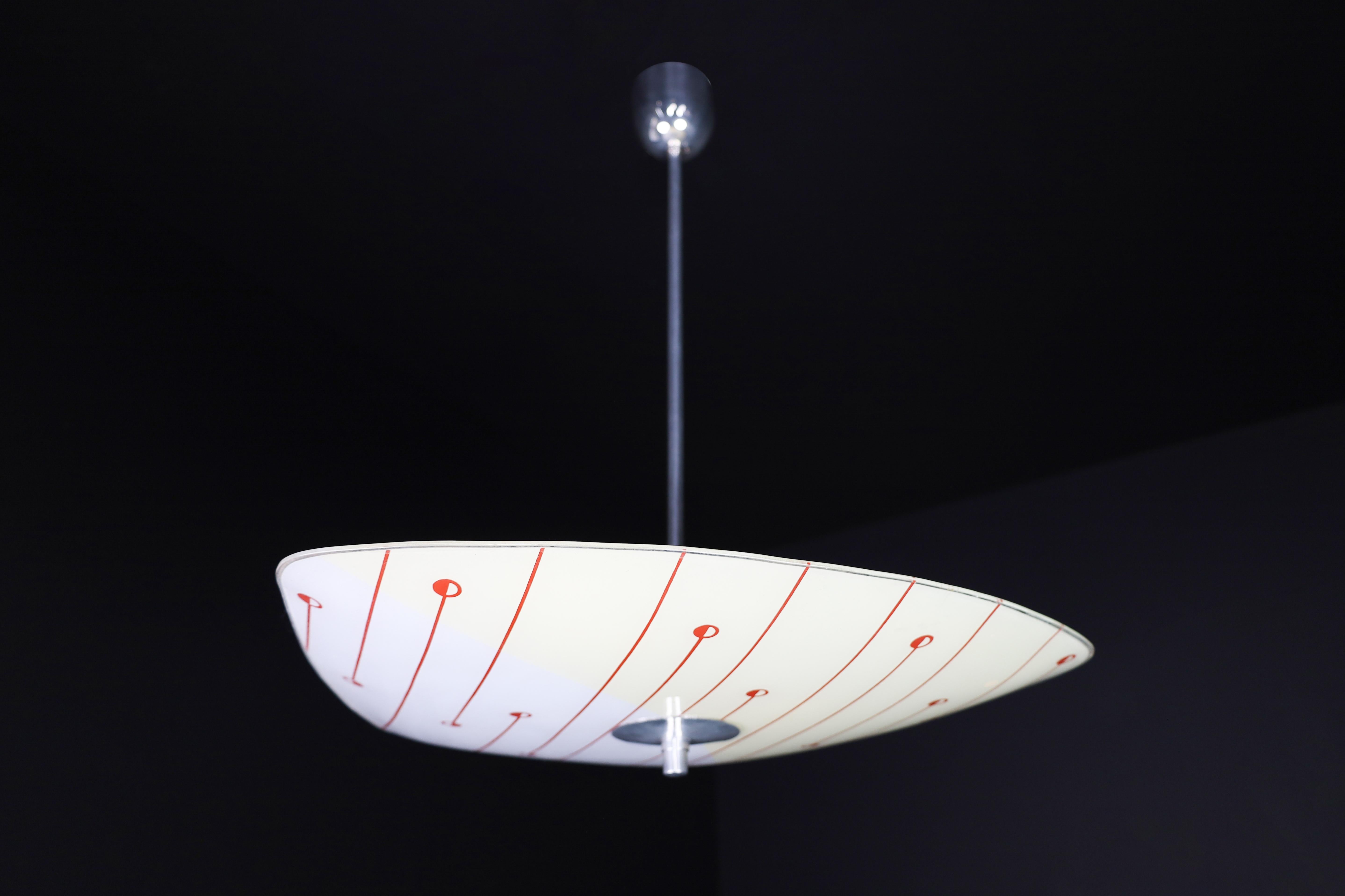 Mid-Century Glass Hanging Pendant Lamp Brussels World Expo 1958

This pendant lamp is a magnificent piece of mid-century graphics and design that was showcased at the Czechoslovakia Pavilion during the Brussels World Fair in 1958. The shade is in
