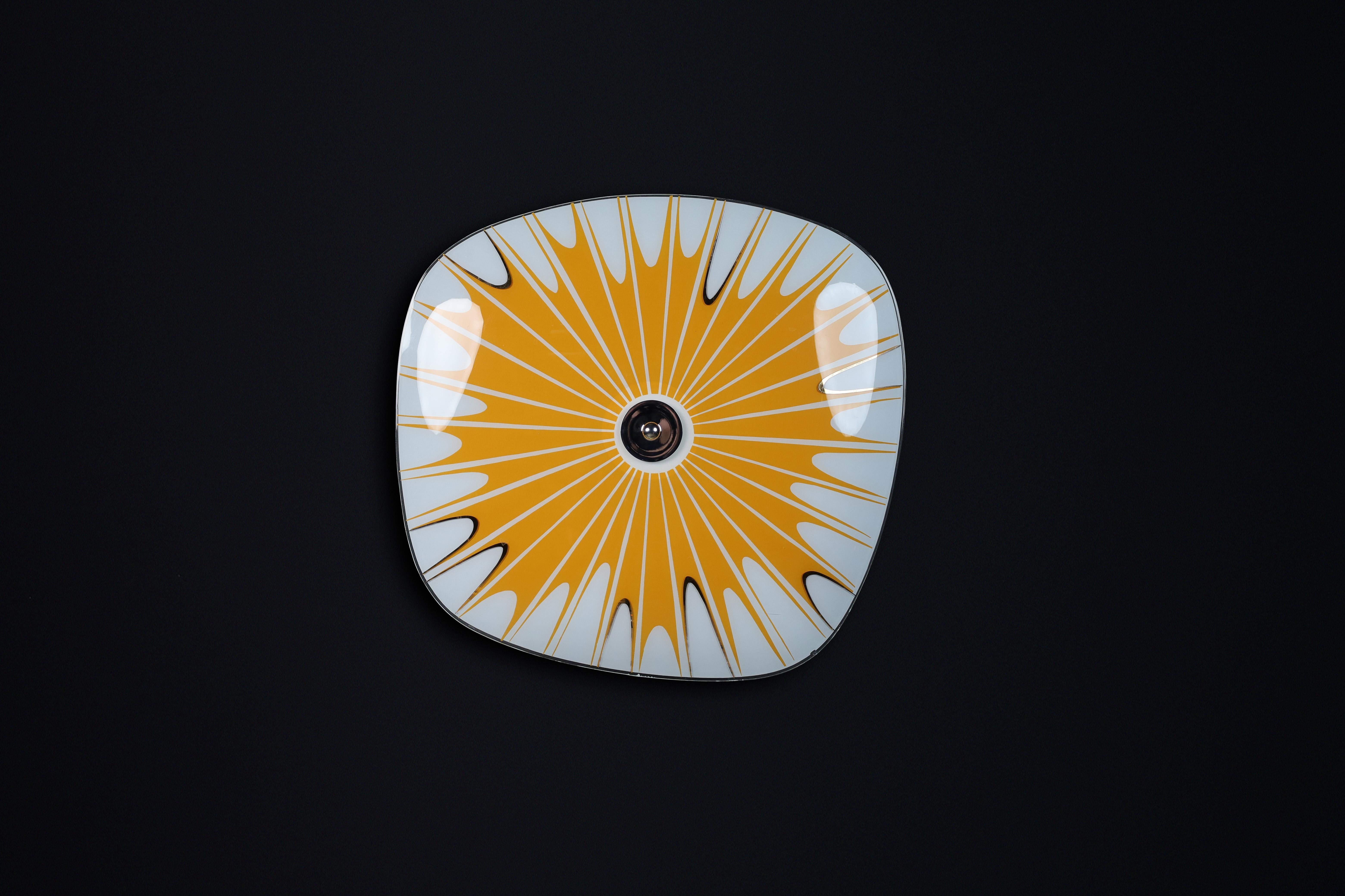 Mid-Century Glass Hanging Pendant Lamp or Wall Light Brussels World Expo 1958 (no:1)

This lighting is a stunning example of mid-century design and graphics, showcased at the Czechoslovakia Pavilion during the Brussels World Fair 1958. The lampshade