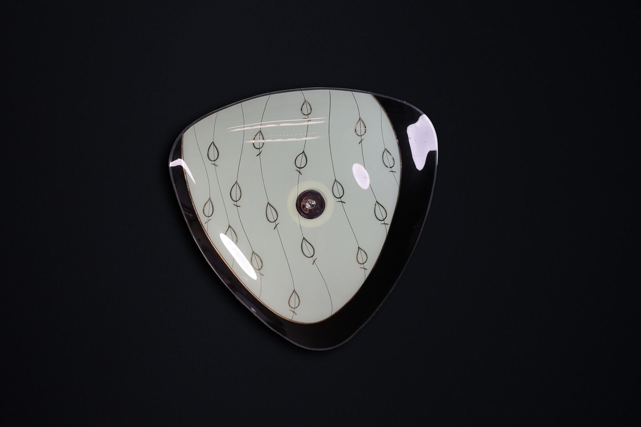 Mid-Century Glass Hanging Pendant Lamp or Wall Light Brussels World Expo 1958 (no:26)

This lighting is a stunning example of mid-century design and graphics, showcased at the Czechoslovakia Pavilion during the Brussels World Fair 1958. The