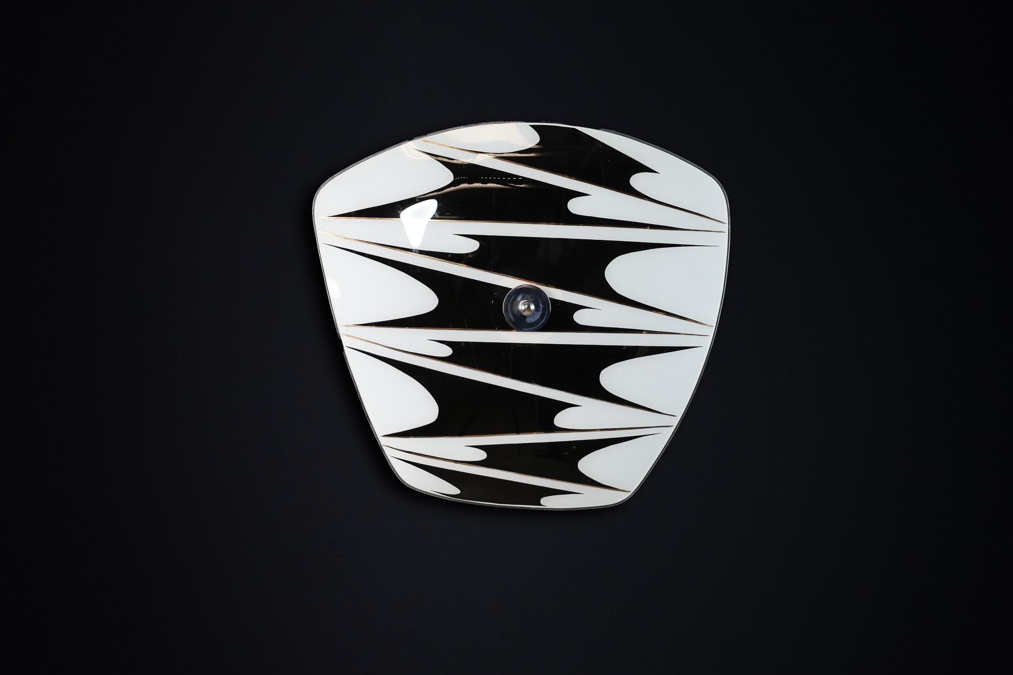 Mid-Century Glass Hanging Pendant Lamp or Wall Light Brussels World Expo 1958 (no:29)

This lighting is a stunning example of mid-century design and graphics, showcased at the Czechoslovakia Pavilion during the Brussels World Fair 1958. The