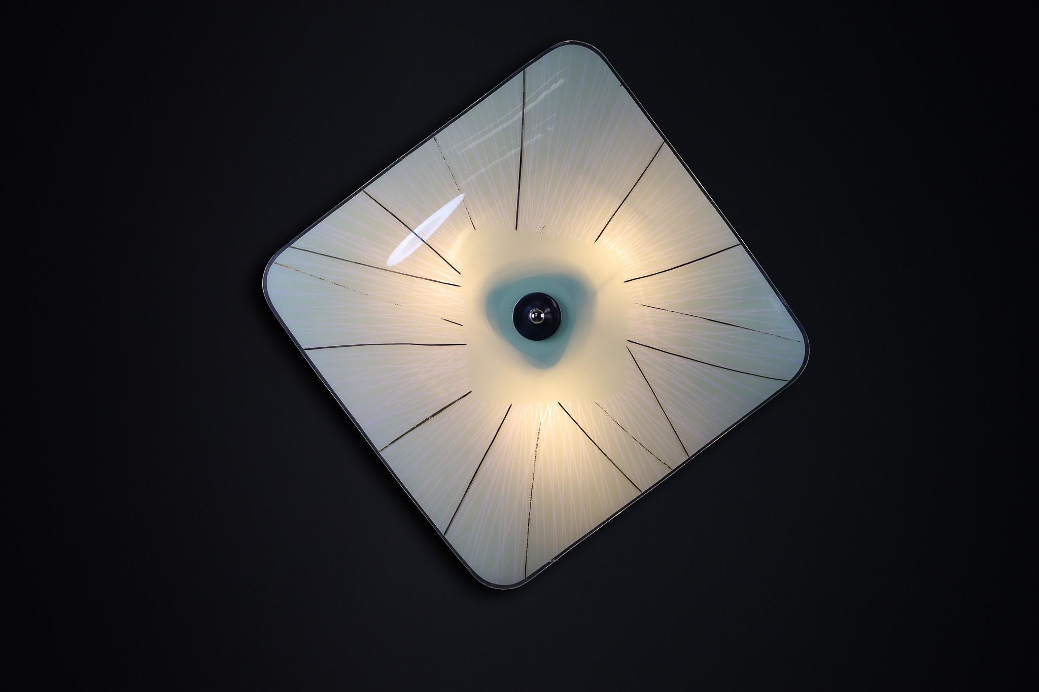 Mid-Century Glass Hanging Pendant Lamp or Wall Light Brussels World Expo 1958 (no:31)

This lighting is a stunning example of mid-century design and graphics, showcased at the Czechoslovakia Pavilion during the Brussels World Fair 1958. The