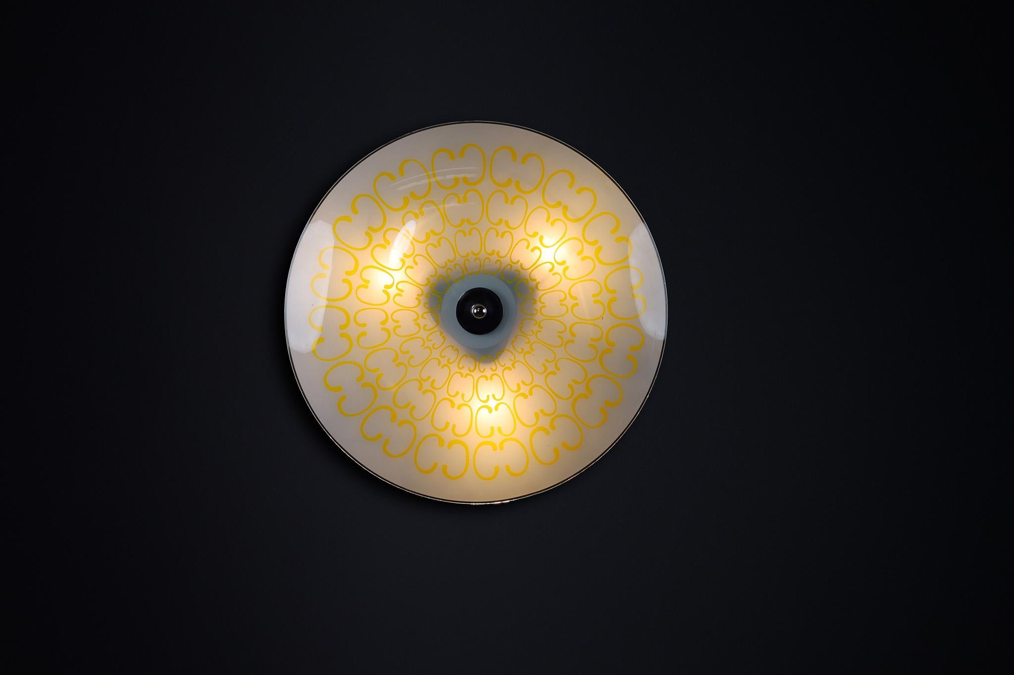 Mid-Century Glass Hanging Pendant Lamp or Wall Light Brussels World Expo 1958 (no:36)

This lighting is a stunning example of mid-century design and graphics, showcased at the Czechoslovakia Pavilion during the Brussels World Fair 1958. The