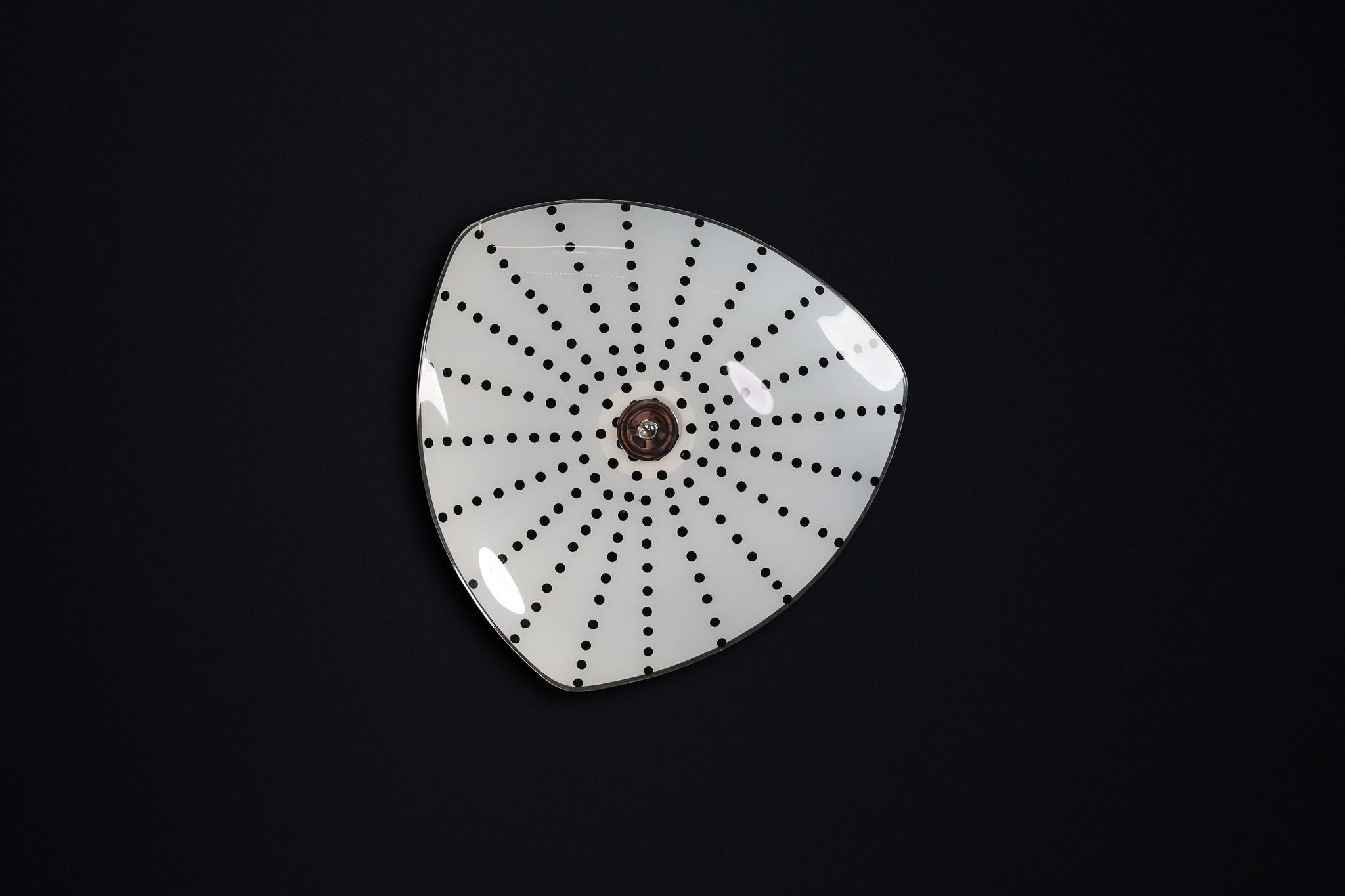 Mid-Century Glass Hanging Pendant Lamp or Wall Light Brussels World Expo 1958 (no11)

This lighting is a stunning example of mid-century design and graphics, showcased at the Czechoslovakia Pavilion during the Brussels World Fair 1958. The lampshade
