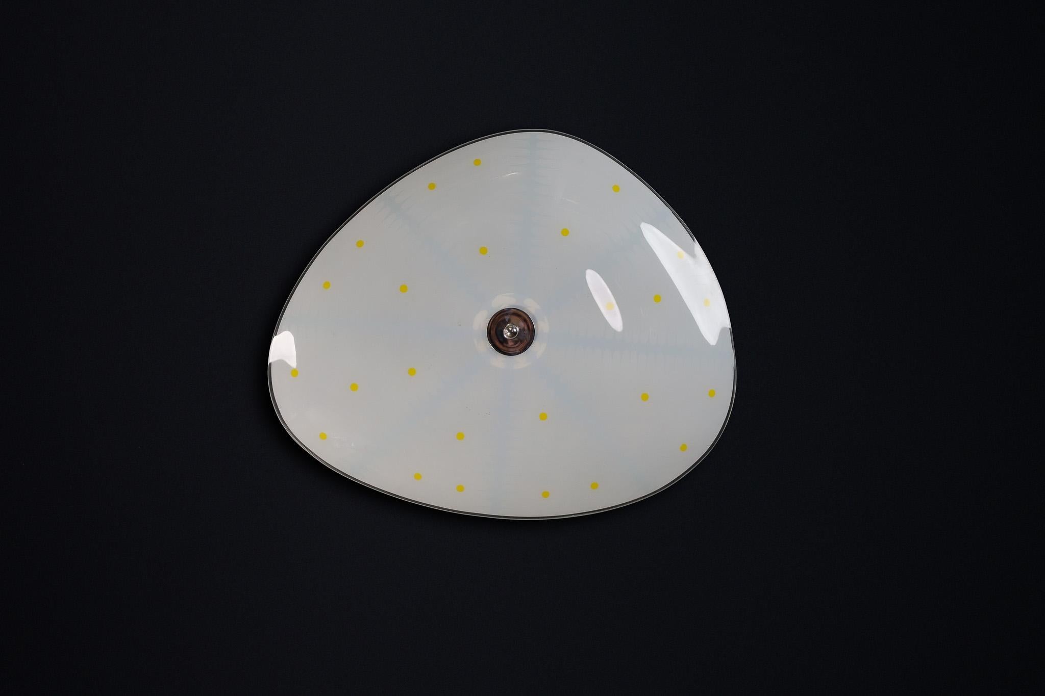Mid-Century Glass Hanging Pendant Lamp or Wall Light Brussels World Expo 1958 (no18)

This lighting is a stunning example of mid-century design and graphics, showcased at the Czechoslovakia Pavilion during the Brussels World Fair 1958. The lampshade