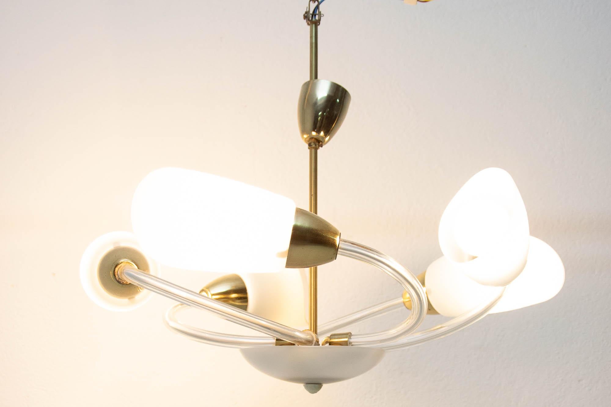Midcentury brass and glass pendant lamp in the shape of the bloom, it was made in Czechoslovakia in the 1960s. In very good condition, new wiring.