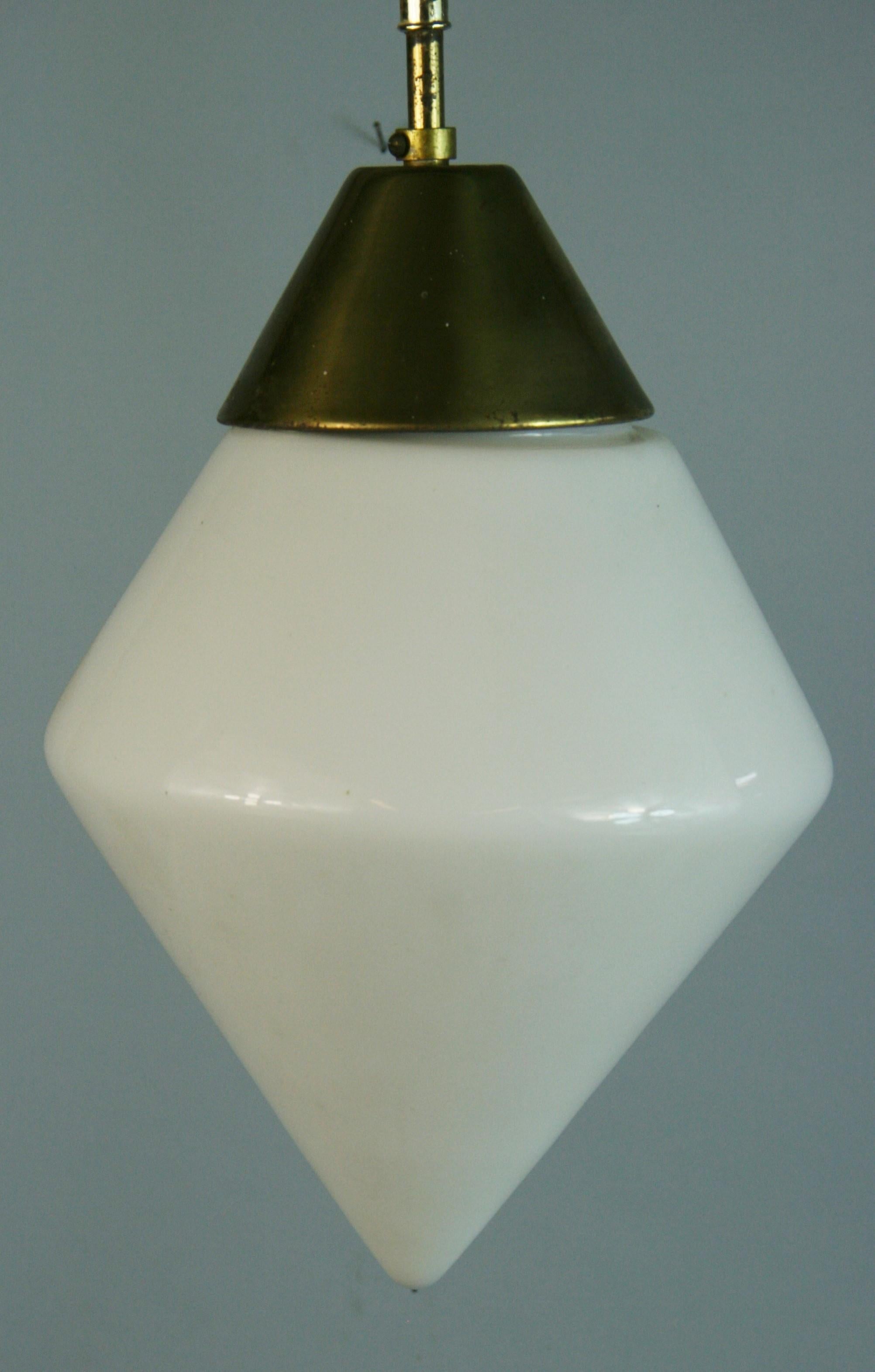 1616 a milk glass / brass hardware single light pendant.
2 available 
Price individually.
    