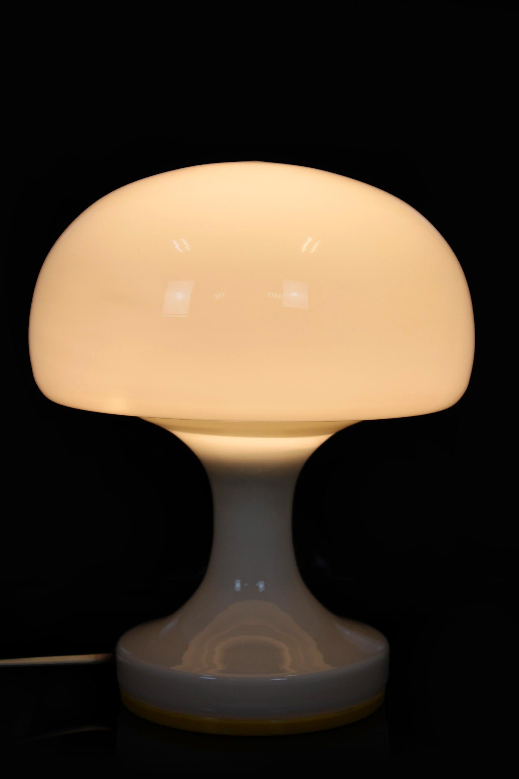 This glass table lamp was made by Osvetlovací Sklo in Czechoslovakia in the 1970s.
 