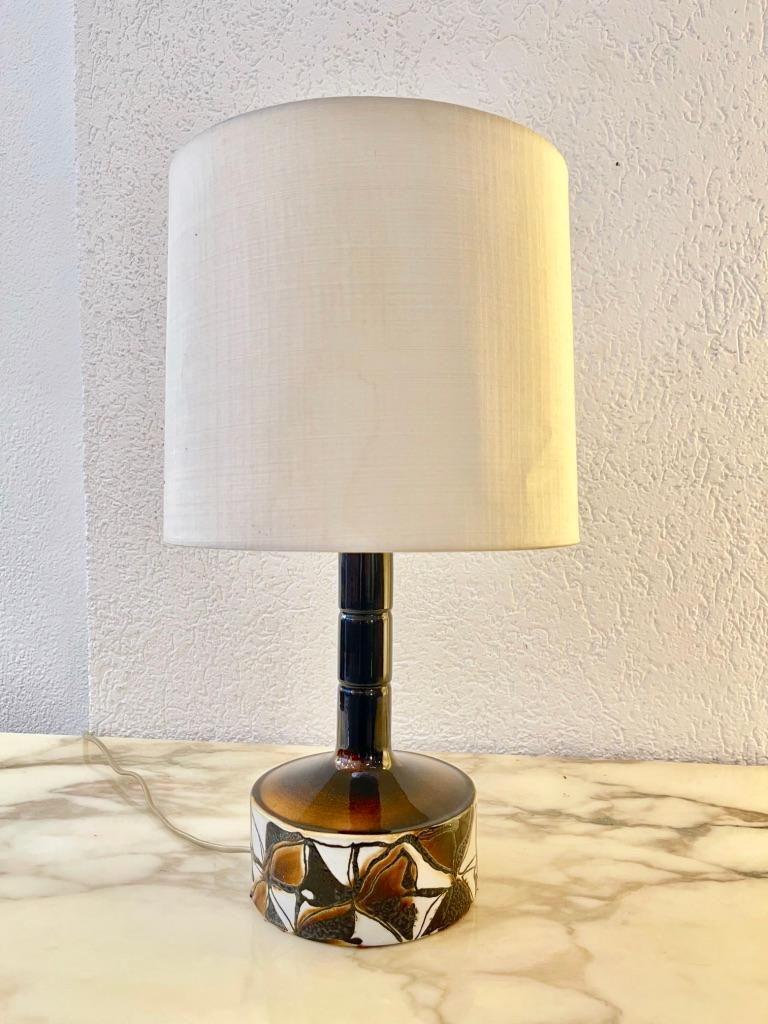Beautiful glazed ceramic table lamp with original paper shade by Royal Copenhagen Ceramic company, Denmark ca. 1960s
Original electrification, fully functional on/off switch.
Signed at the bottom.

