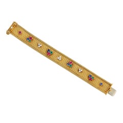 Mid-Century gold and multi-gem trefoil bracelet