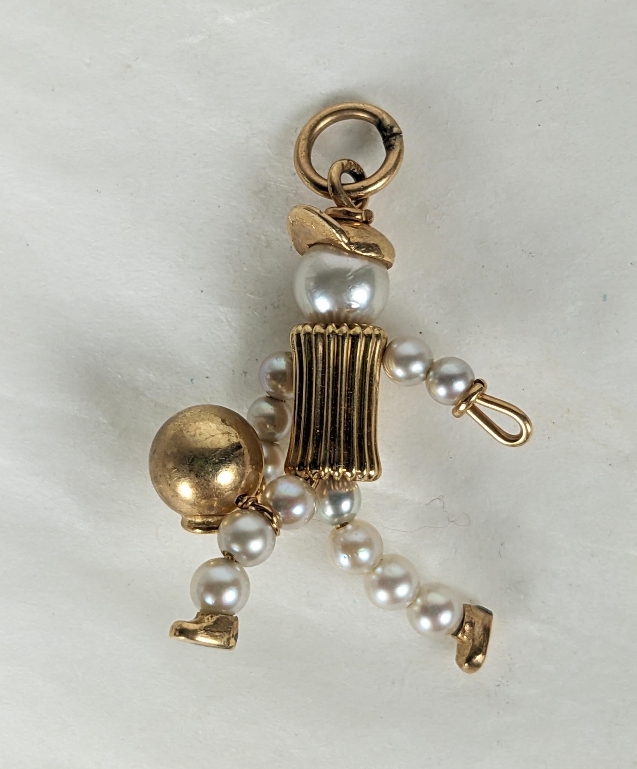 Charming Mid Century Gold and Pearl Bowler Charm of cast 14k gold elements and cultured pearls. Beautiful detailing and construction, 1950's USA. 1