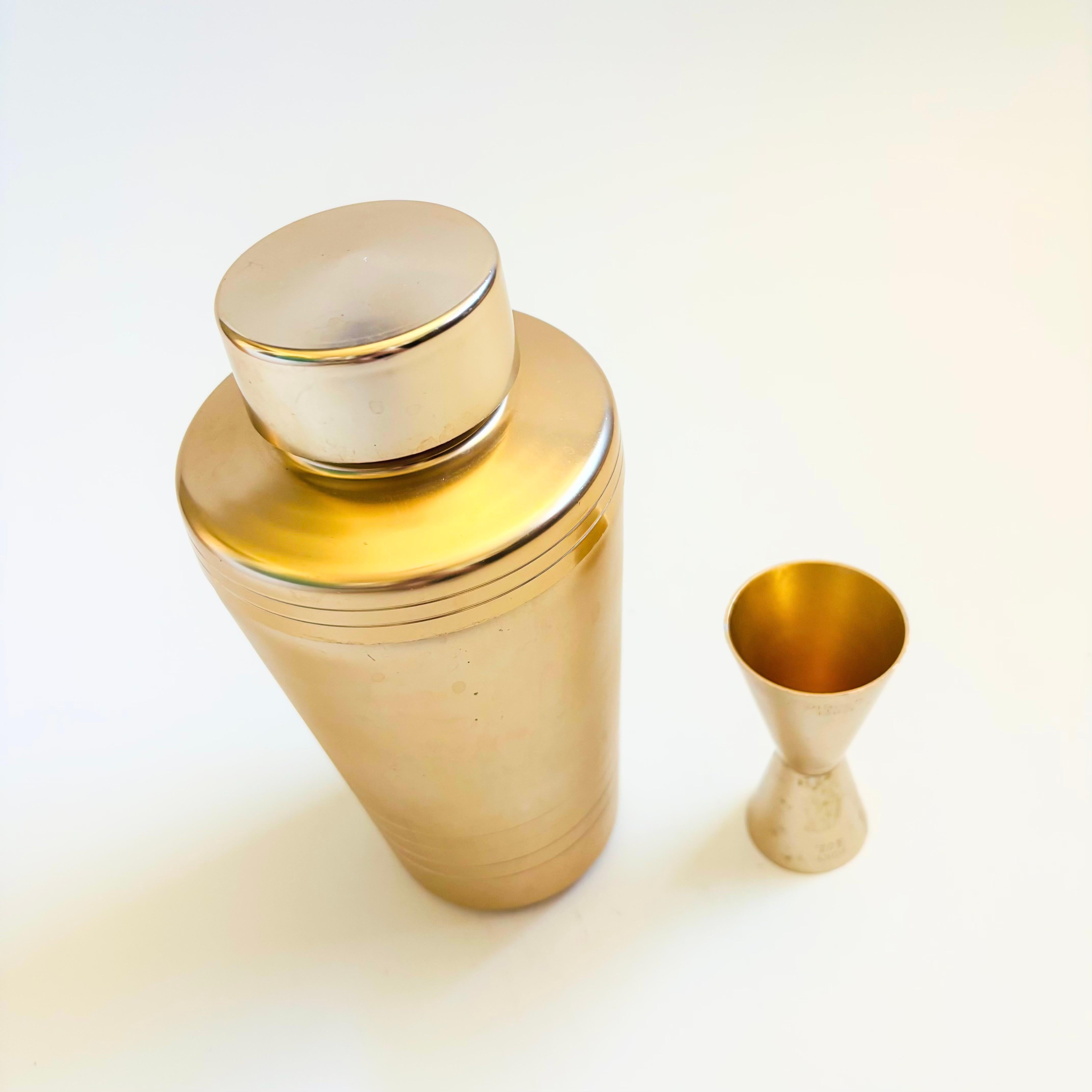 American Mid Century Gold Cocktail Shaker and Jigger by Mirro For Sale