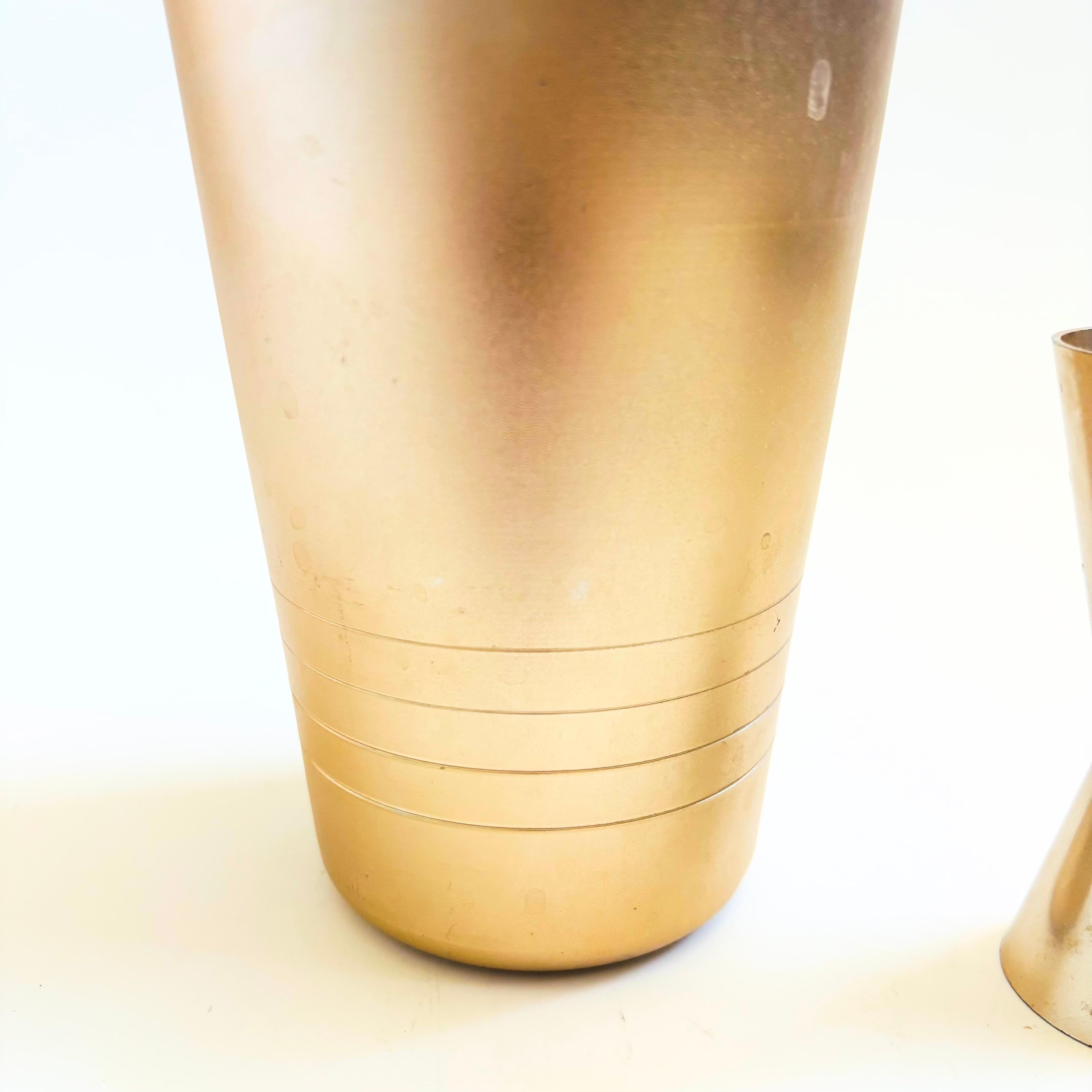 20th Century Mid Century Gold Cocktail Shaker and Jigger by Mirro For Sale