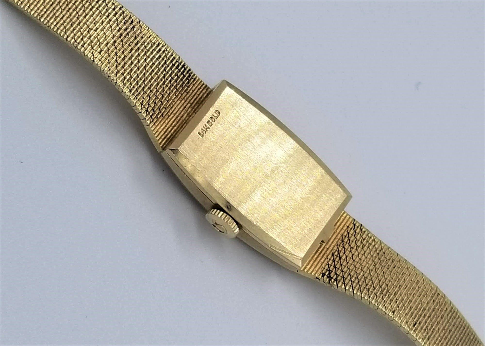 Gold-Diamantbesetzte Damenarmbanduhr von Omega aus der Mitte des Jahrhunderts im Angebot 1