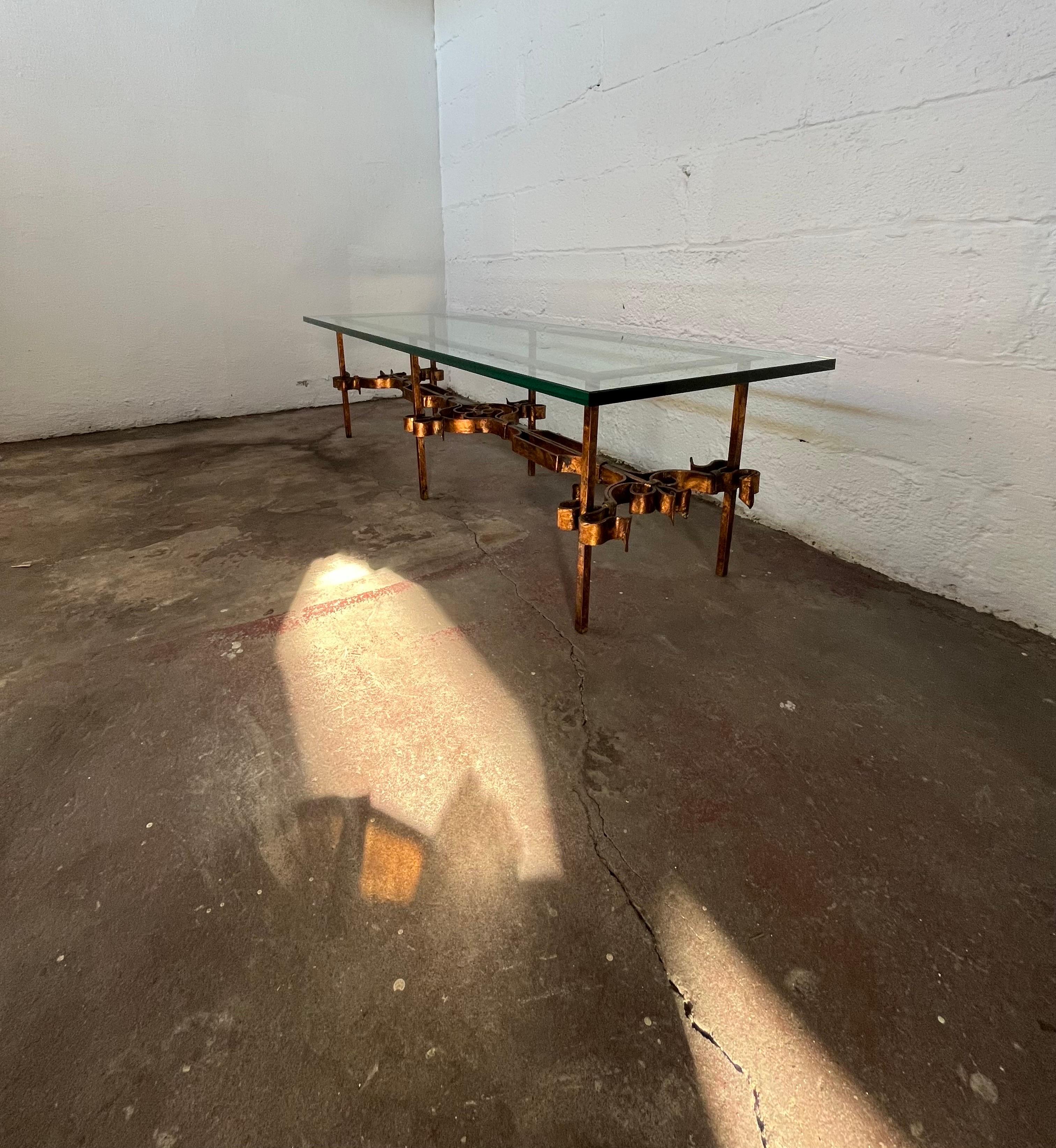 Mid Century Gold Gilt Scrolling Iron Glass Coffee table In Good Condition For Sale In W Allenhurst, NJ
