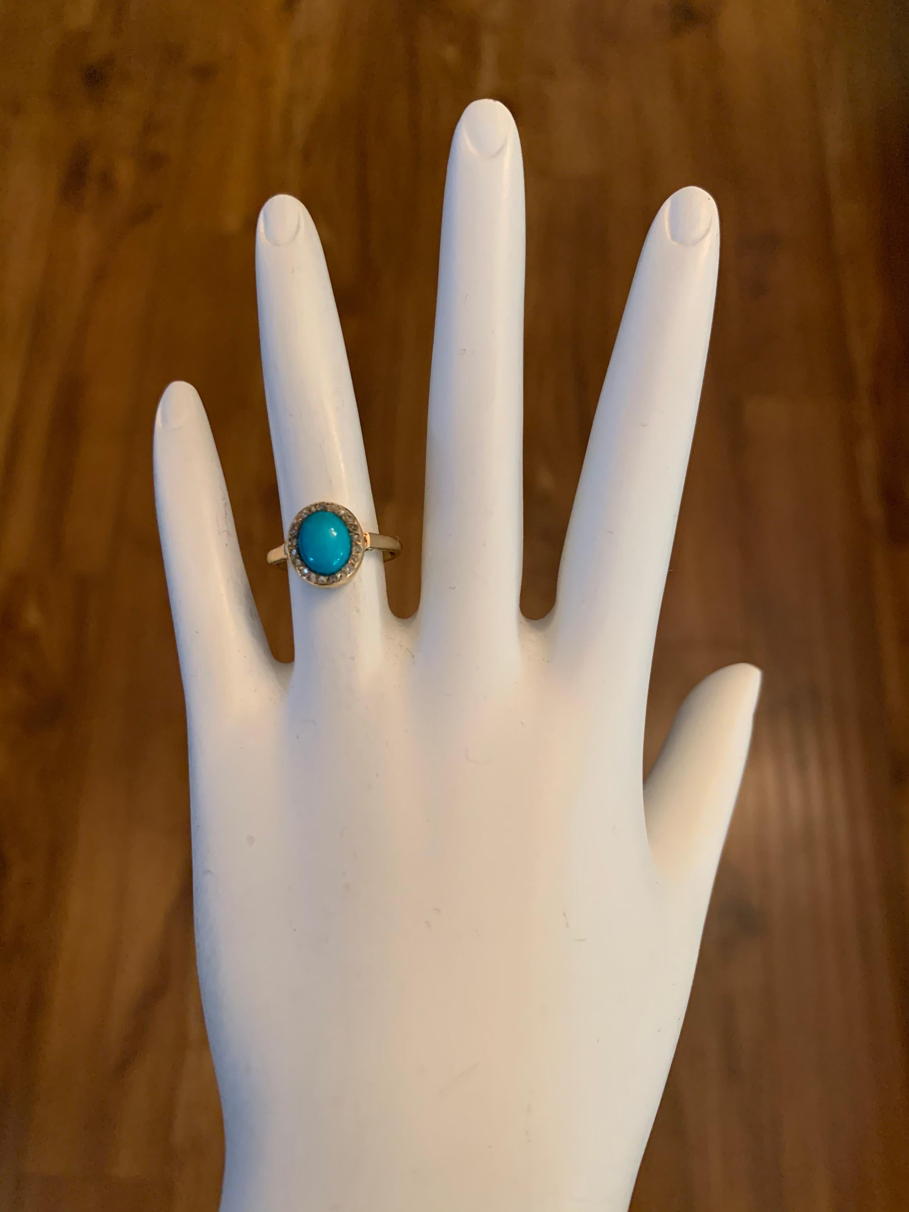 Stunning Mid Century Gold Ring Natural Persian Cabochon (8x6.5mm) Turquoise & 21 Natural Old Mine Diamonds Circa 1950. The ring weighs 2.7 grams and is a size 4.75+.