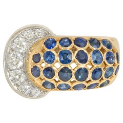 Retro Mid-Century Gold, Sapphire, and Diamond Ring of Stylized Belt Buckle Design