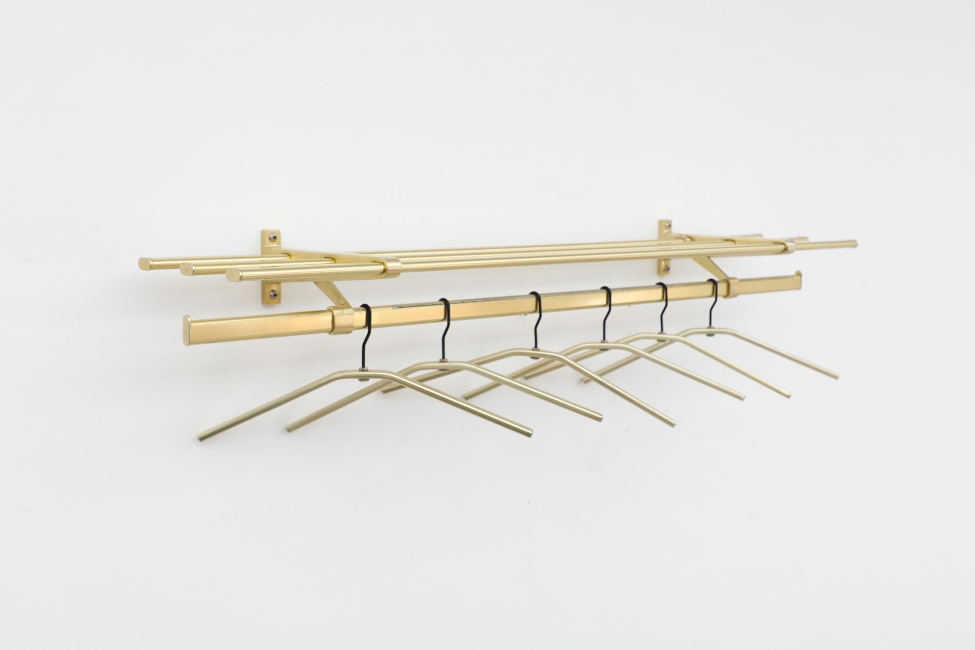 Mid-Century Gold Toned Coat Rack with Hangers In Good Condition For Sale In Los Angeles, CA