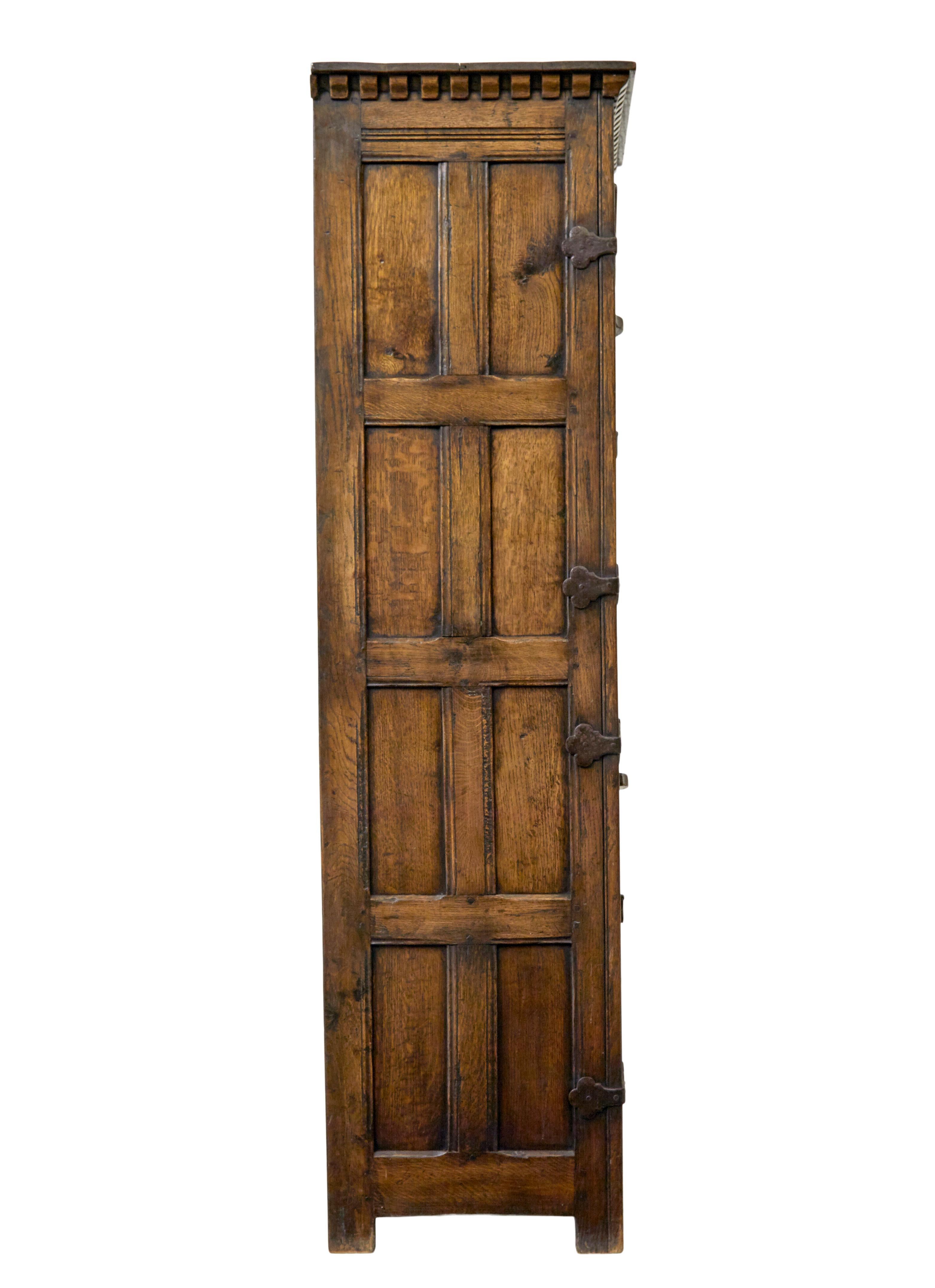 Mid century gothic revival carved oak hall cupboard For Sale at 1stDibs