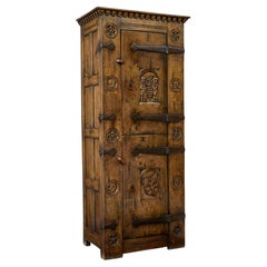 Mid century gothic revival carved oak hall cupboard