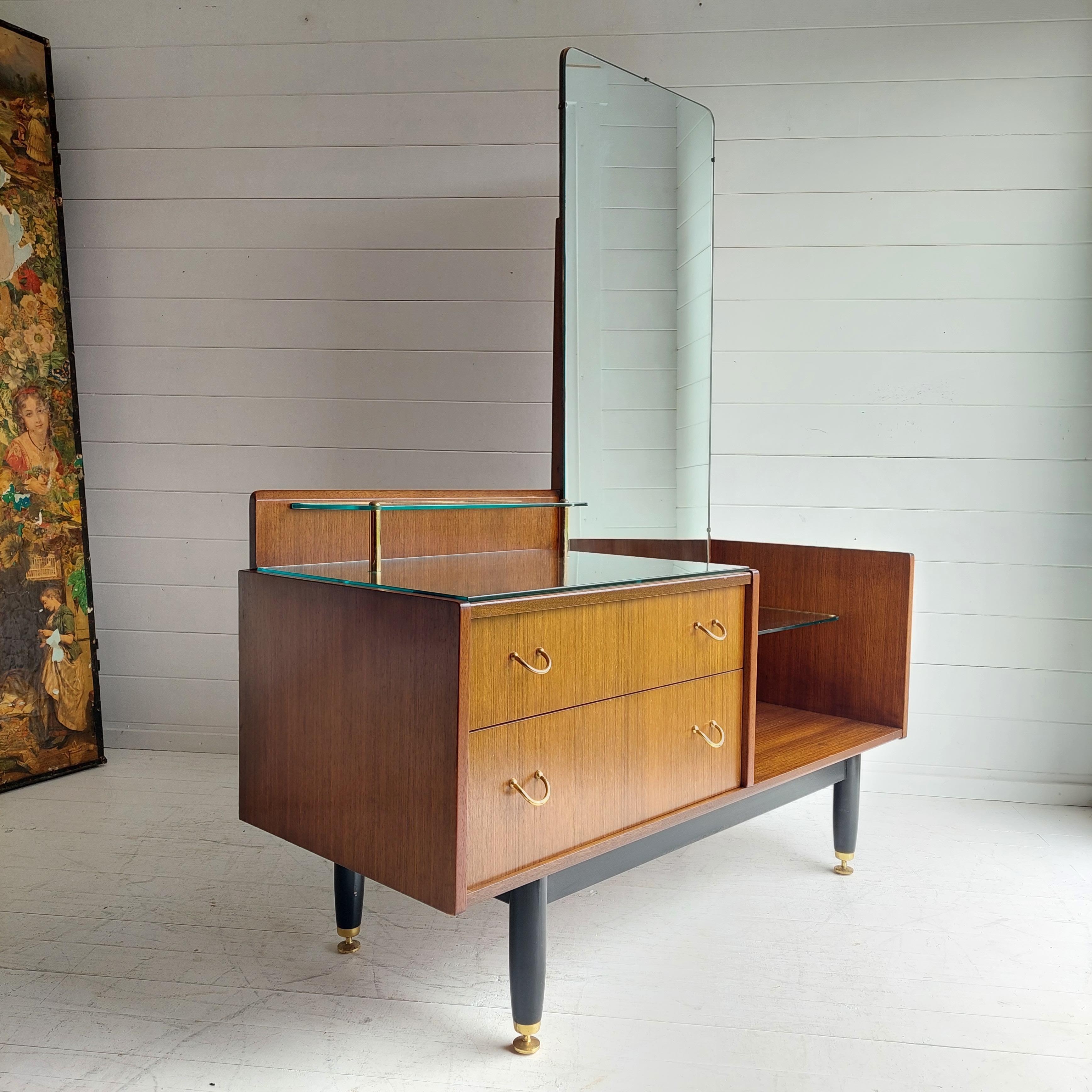 G Plan Dressing Table with Cheval Mirror
Librenza Rnage, 1950s-1960s

It has an excellent and unusual shape which would look great in any bedroom or entryway its placed in!

A very attractive midcentury dressing table by E. Gomme for G Plan.