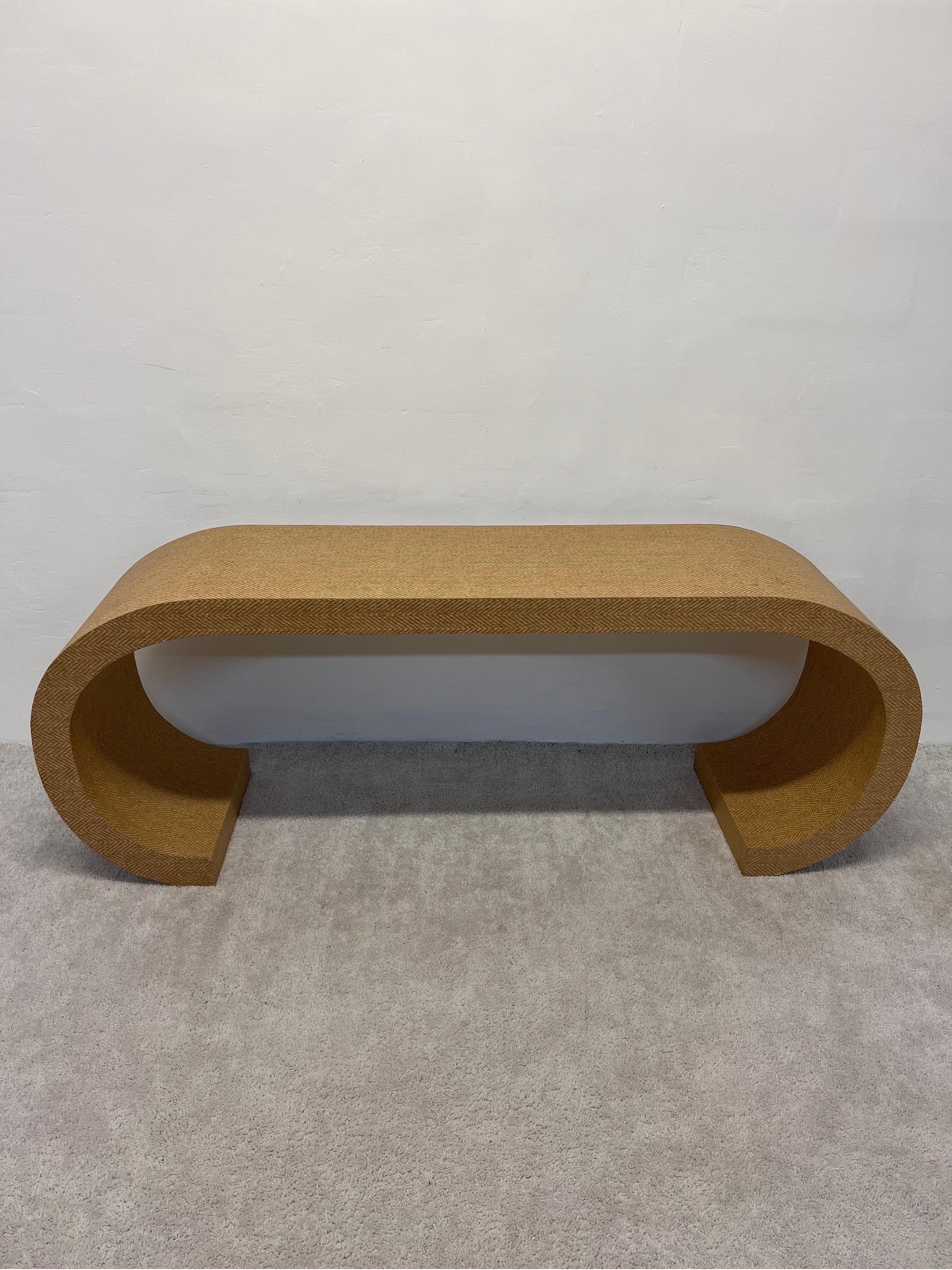 Scroll console table covered in chevron patterned grasscloth from the 1970s.