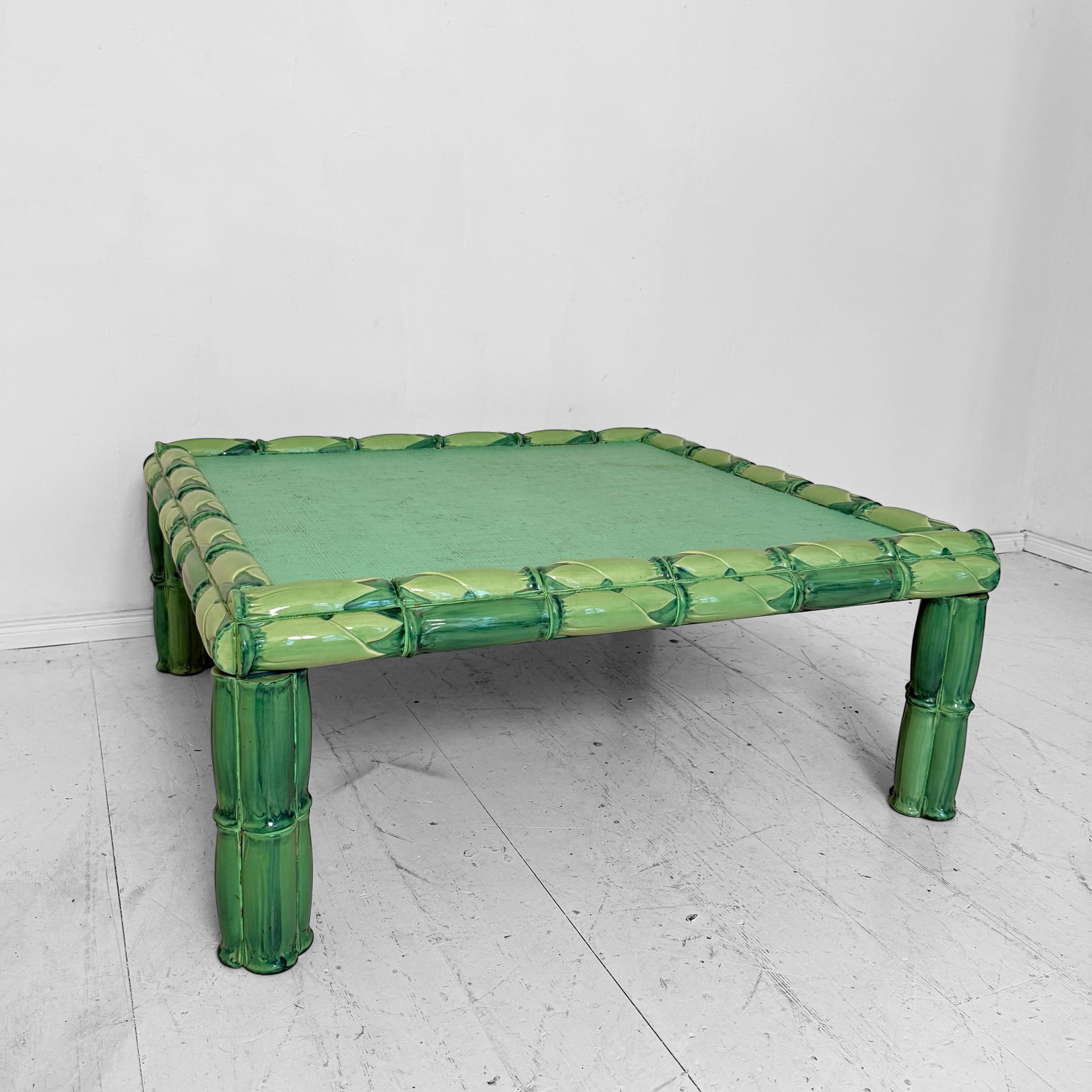 A rare and striking Mid-Century coffee table designed by Colin Morrow for Arpex Rome in the 1970s, showcasing bold creativity and sculptural form. Crafted in ceramic, the table features a vivid green glaze with a bamboo-style frame and legs, giving