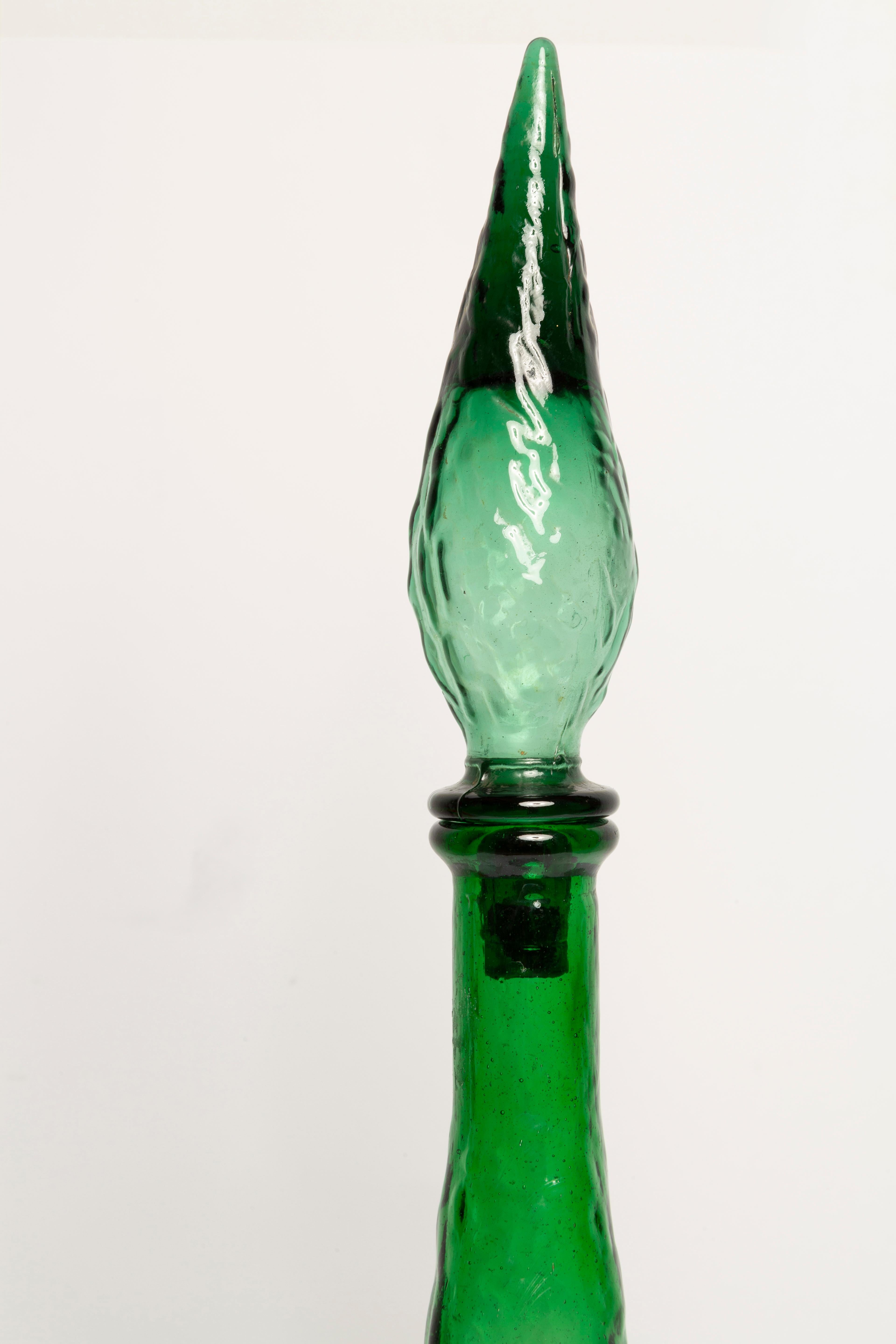 vintage green glass bottle with stopper