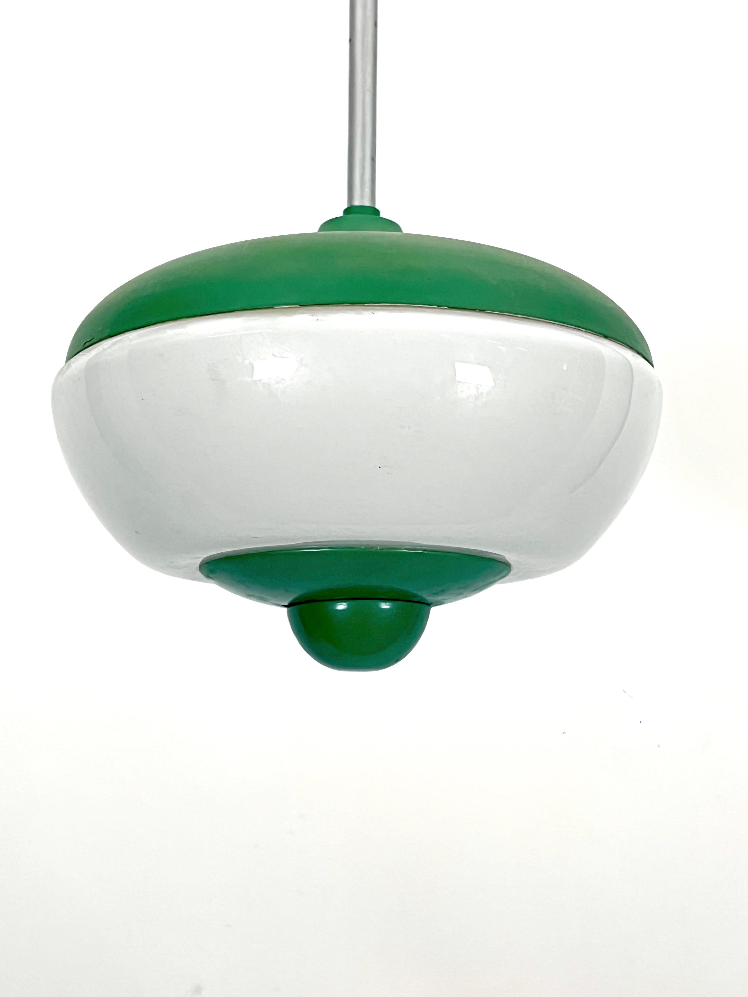 Italian Mid-Century green lacquer and milk glass pendant. Italy 1950s For Sale