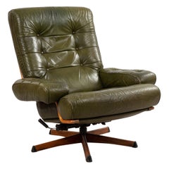 green leather armchair Mid-Century Green Tufted Leather Armchair