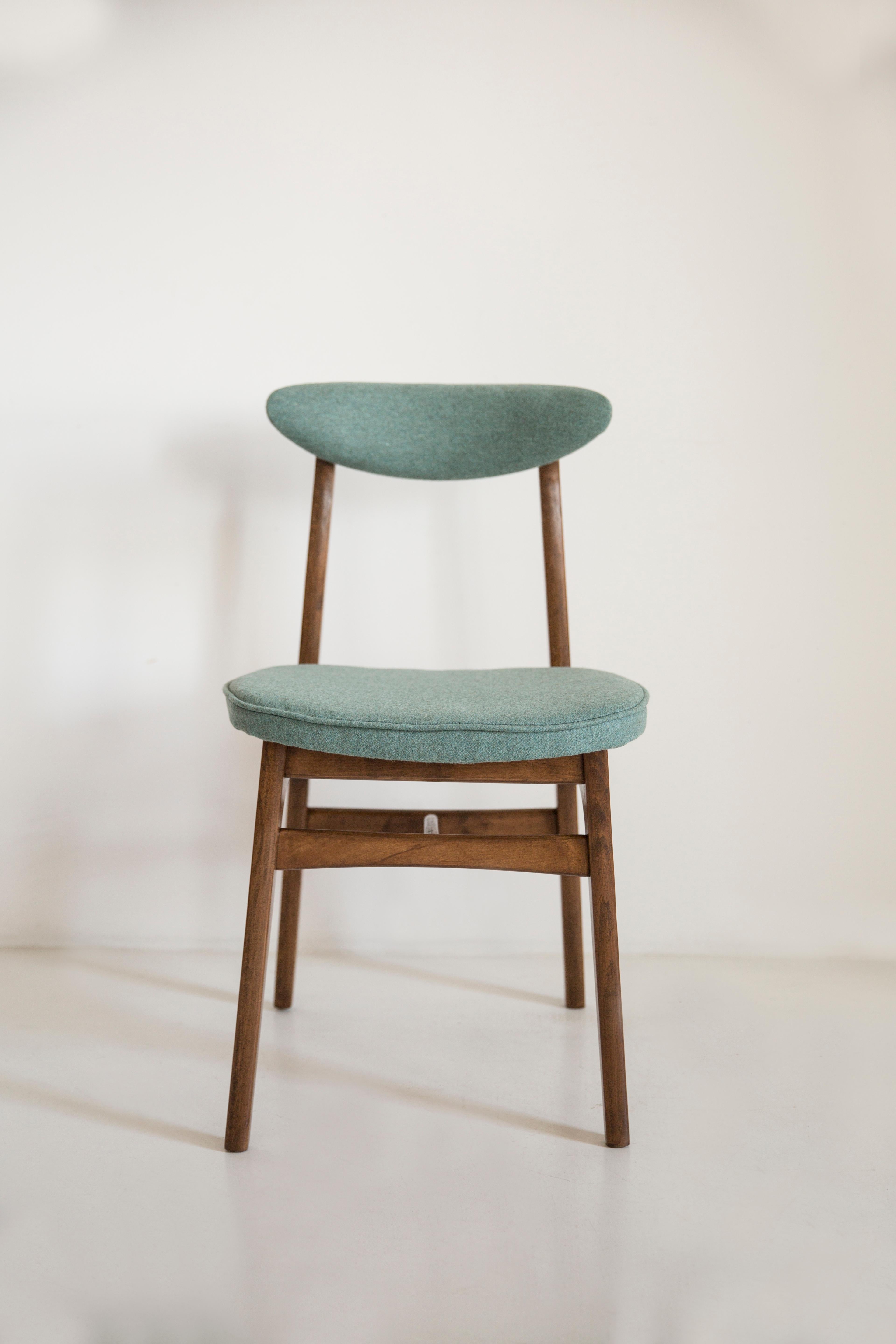 Chair designed by Prof. Rajmund Halas. Made of beechwood. Chair is after a complete upholstery renovation, the woodwork has been refreshed. Seat is dressed in green velvet, durable and pleasant to the touch fabric. Chair is stable and very shapely.