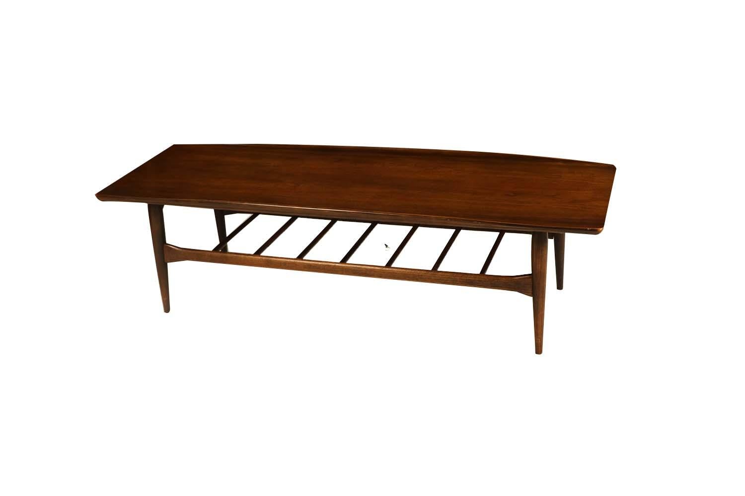 A beautiful, midcentury, modern, retro, 1960s, Danish style, coffee table, by Bassett Furniture Co. from the Artisan Collection, in the style of renown Danish Furniture designer Grete Jalk. The perfect length to pair with an extra long sofa.