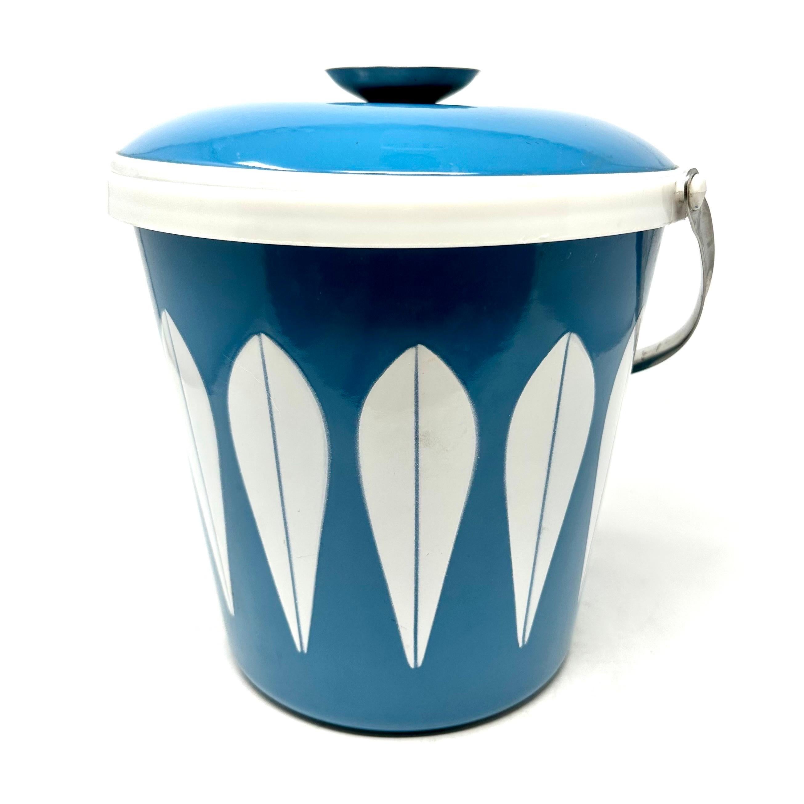 Mid-century ice bucket by Grete Prytz Kittelsen for Cathrineholm, made in Norway. The ice bucket is in Kittelsen’s signature “Lotus” pattern. and is enameled metal with a plastic liner. In excellent condition.

Diameter: 9 in / Height: 10 in