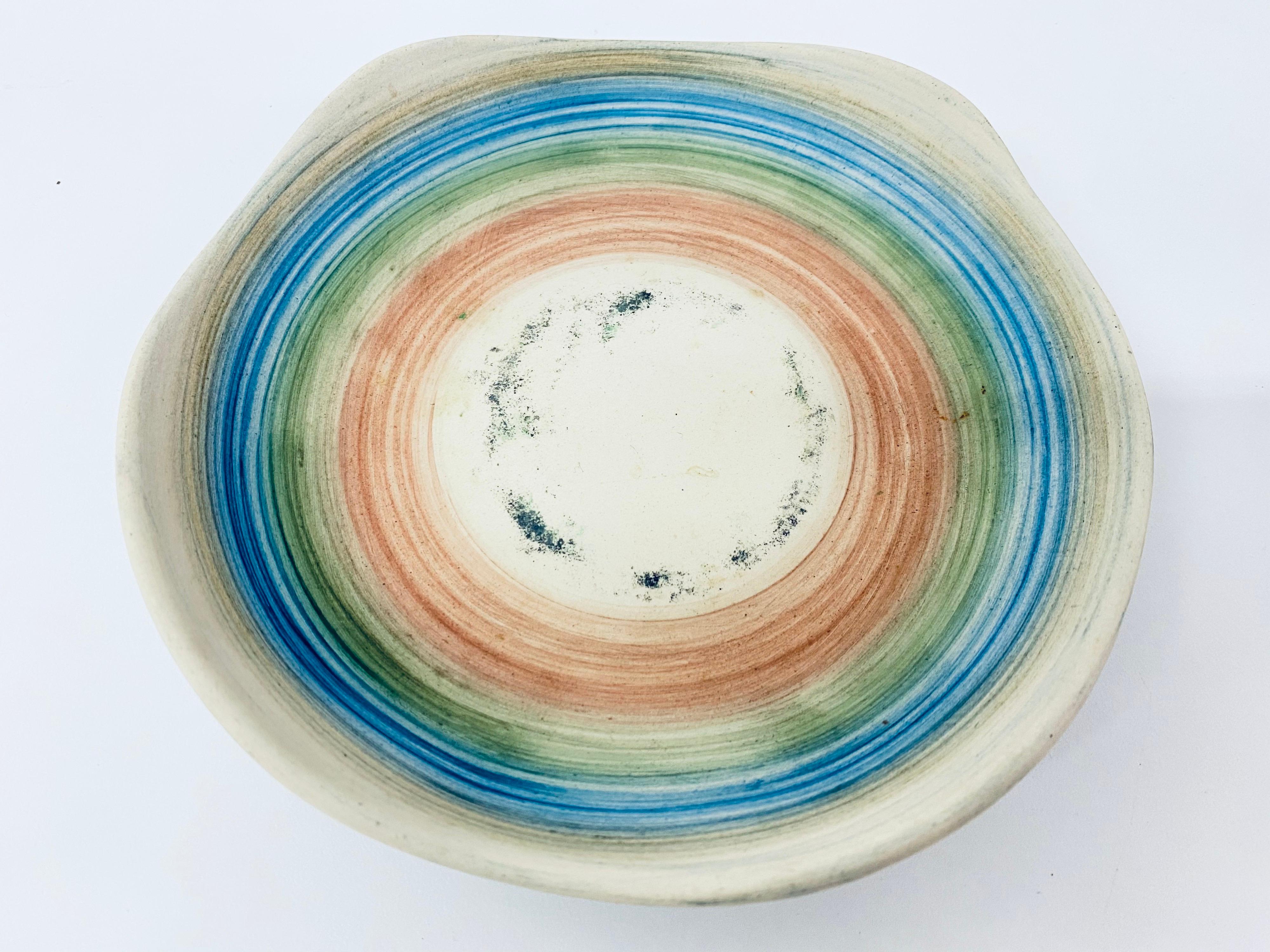 1950s Haeger ceramic catch all or coin dish with variated colors.