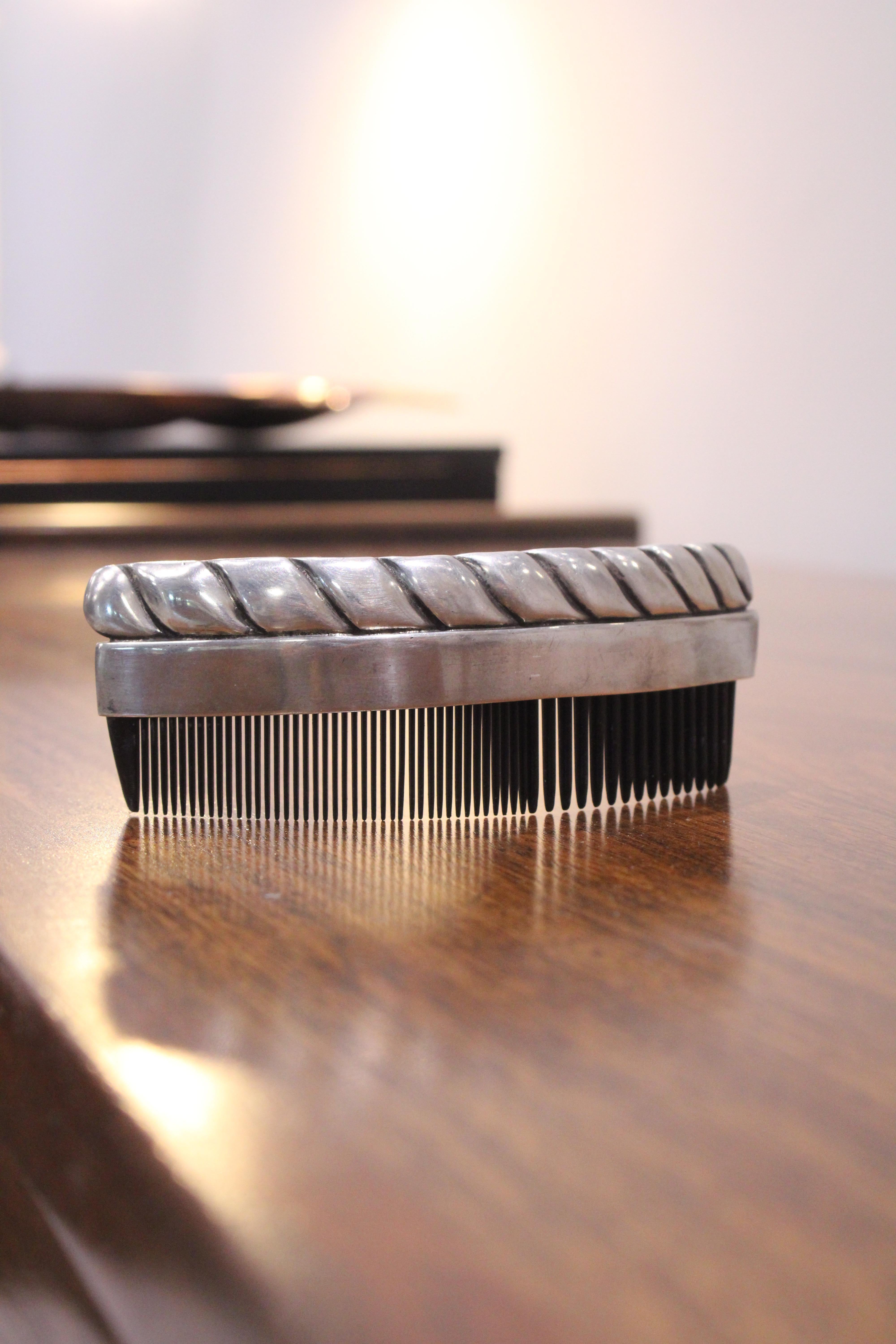 Hair Comb by Hector Aguilar is an exceptional piece of timeless elegance. 
Hector Aguilar was a silversmith, jewelry designer, and artist whose work helped popularize Mexican silver in the 1940s and 1950s.
  