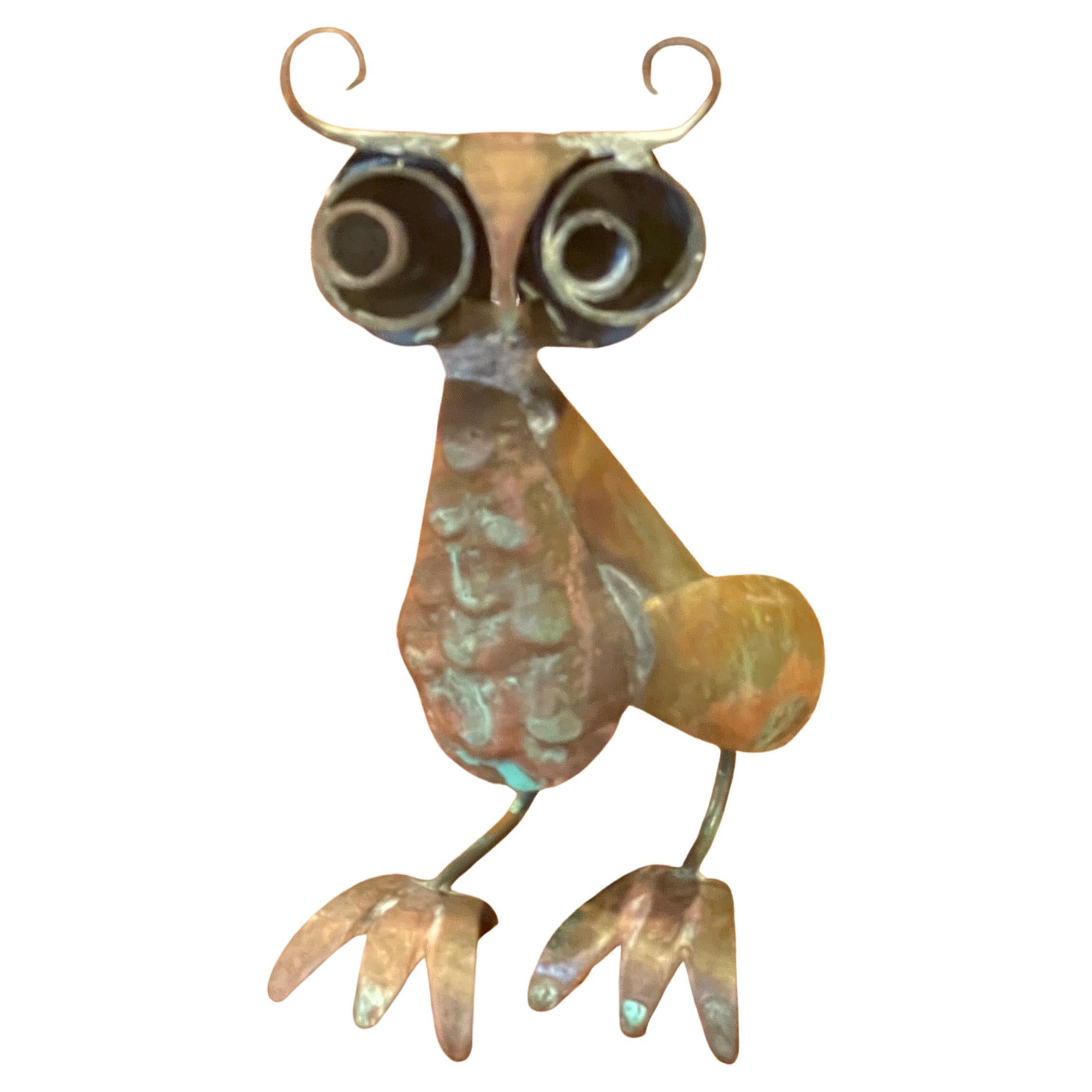 Eclectic MCM patinated copper, hand-hammered, owl sculpture in the style of Mexican artisans Los Castillo, circa 1960s. The sculpture is in very good vintage condition with a great verde patina and measures 3