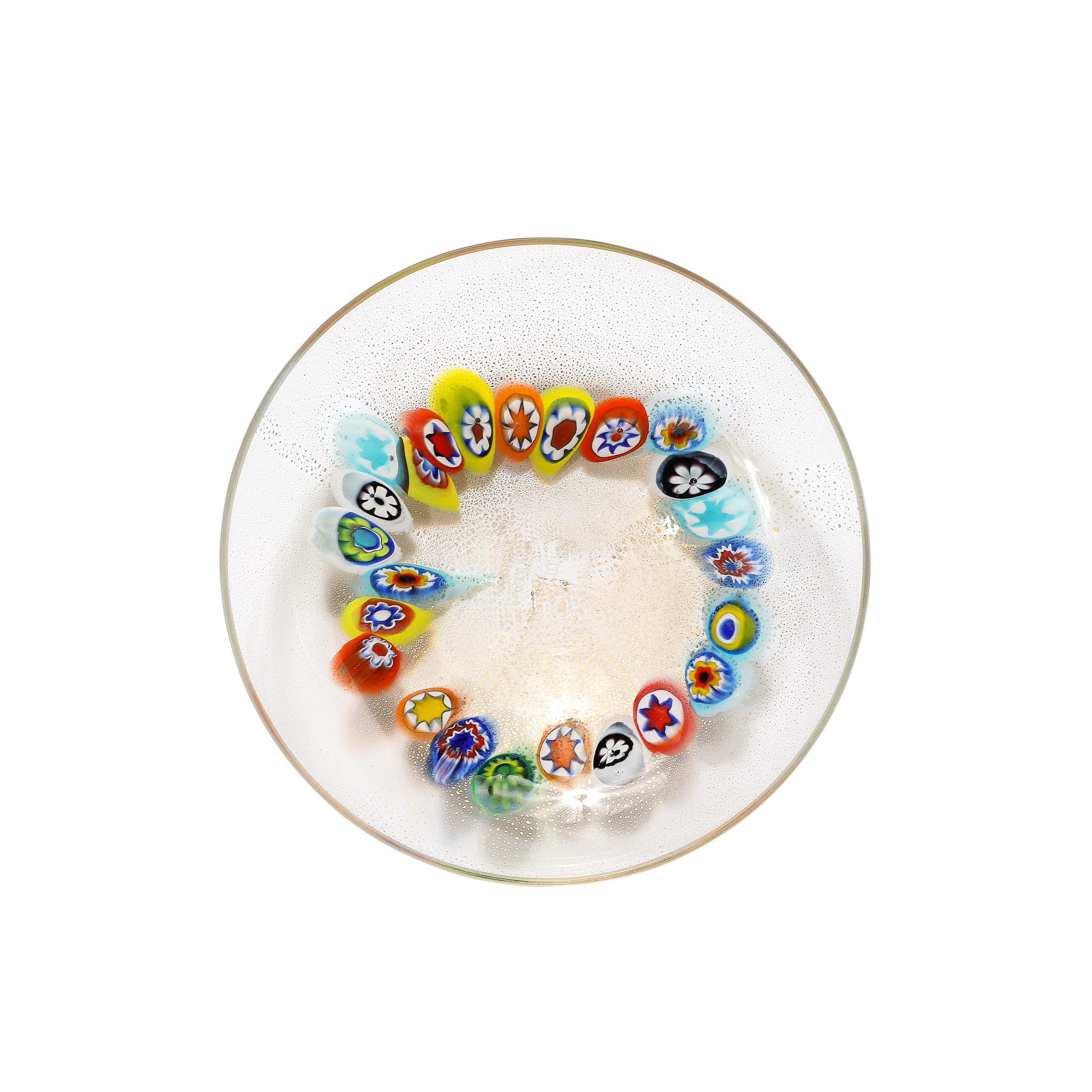 This rare and stunning Mid-Century Modernist Hand-Blown Murano Millifiori & 24 Karat Gold Flecked Glass Plate is Signed Schiavon and originates from Italy, Circa 1960. Featuring a stunning array of glittering colors within the millefiori detailing