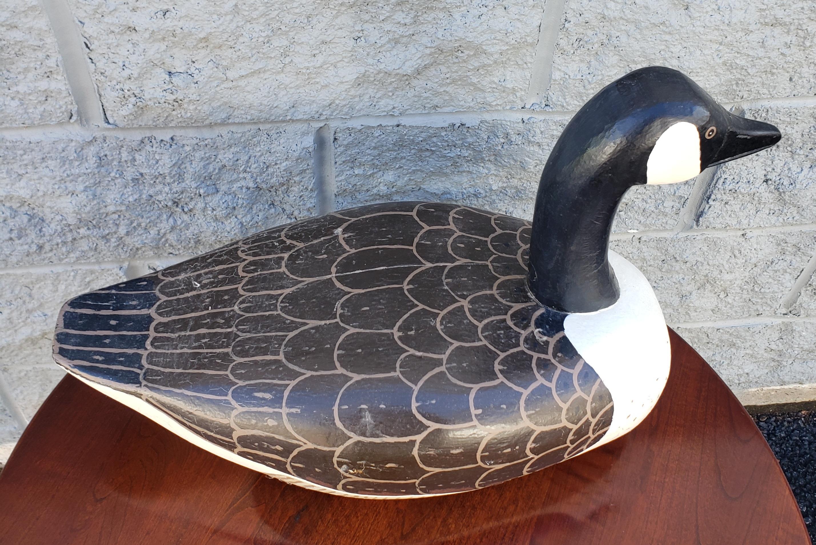 An Mid Century, large, Hand-crafted and Hand-Painted  American life size Duck Decoy measuring 20