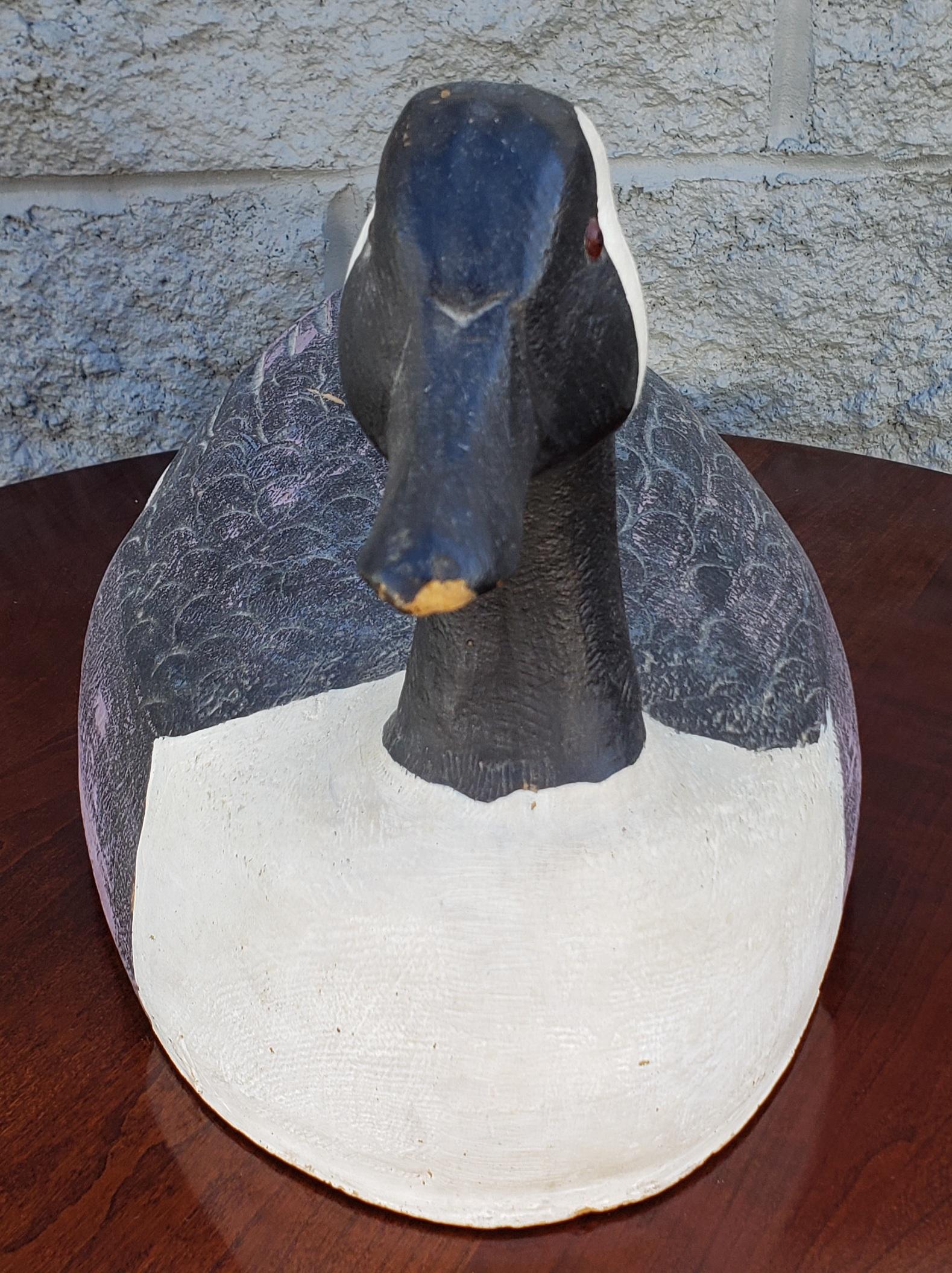 An Mid Century, large, Hand-crafted and Hand-Painted American life size Duck Decoy measuring 21