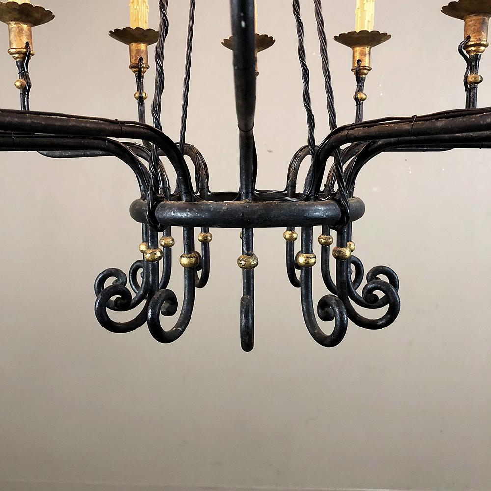 20th Century Midcentury Hand Forged Wrought Iron Country French Chandelier with Gold Accents