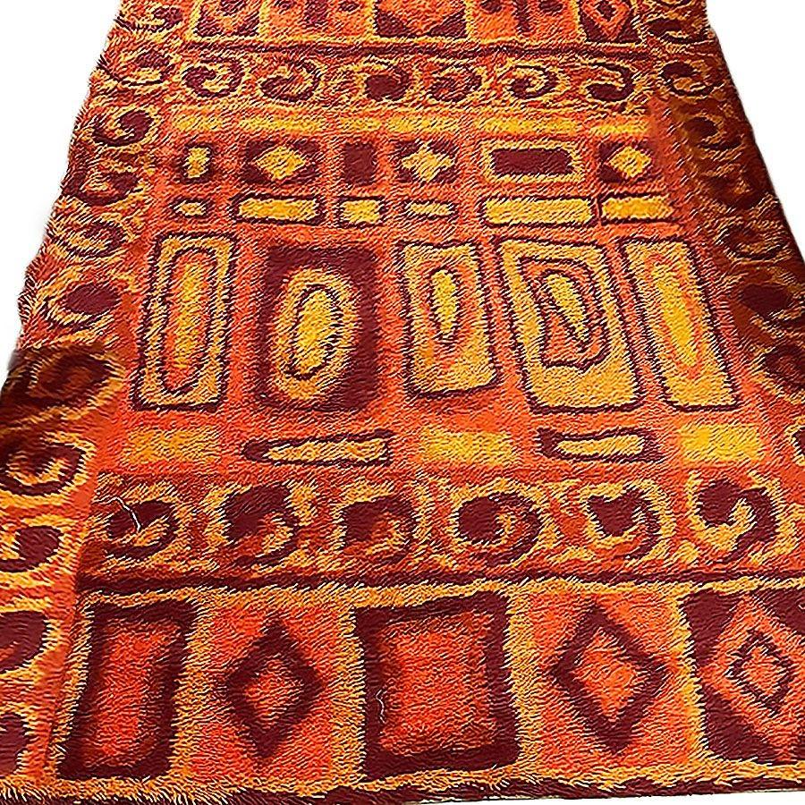 Deep pile Mid-century shag area wool sag rug with abstract design in various shades and shapes of Red, Orange, brown, and burnt orange. It is an excellent piece for accenting your room with color-infused textiles.

Scandinavian rugs are decorative