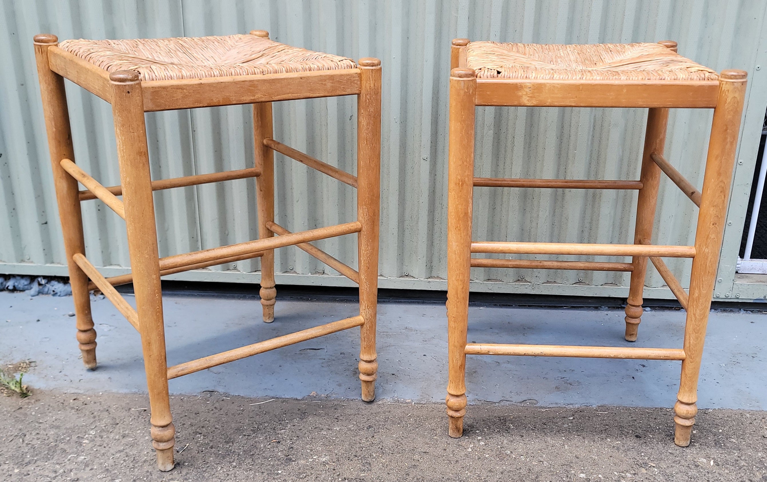 Mid Century hand made pine bar or counter stools.These stools have hand woven rush seats and  a wonderful patina.They are strong & sturdy and very comfortable.