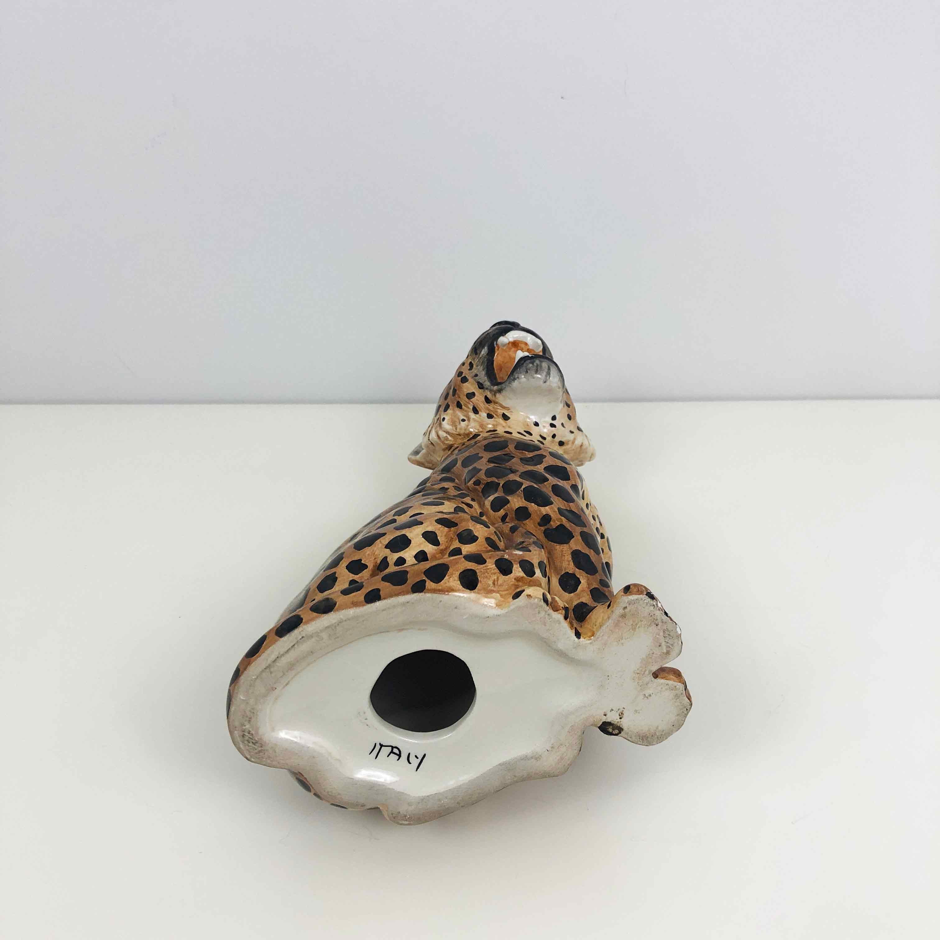 Beautiful hand-painted vintage leopard in ceramic. This figurine was made in Italy.

Italy, 1950s

Designer/Manufacturer: Unknown 

In good vintage condition. There are some small chips from the glaze, this is clearly visible in the