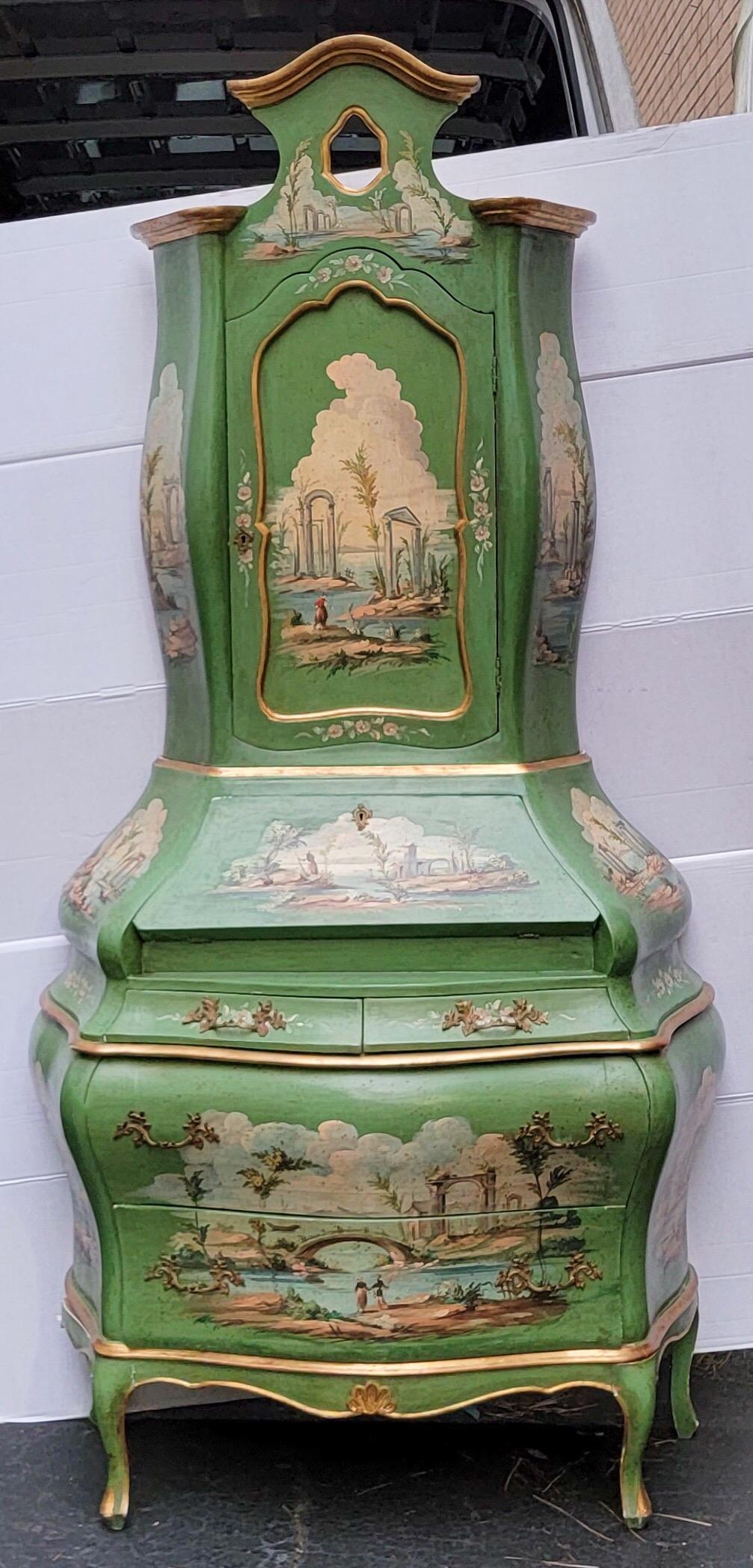 This is a 1960s hand painted Venetian bombay form secretary. It is a wonderful shade of green with Italian pastoral scenes throughout. It is in very good condition.