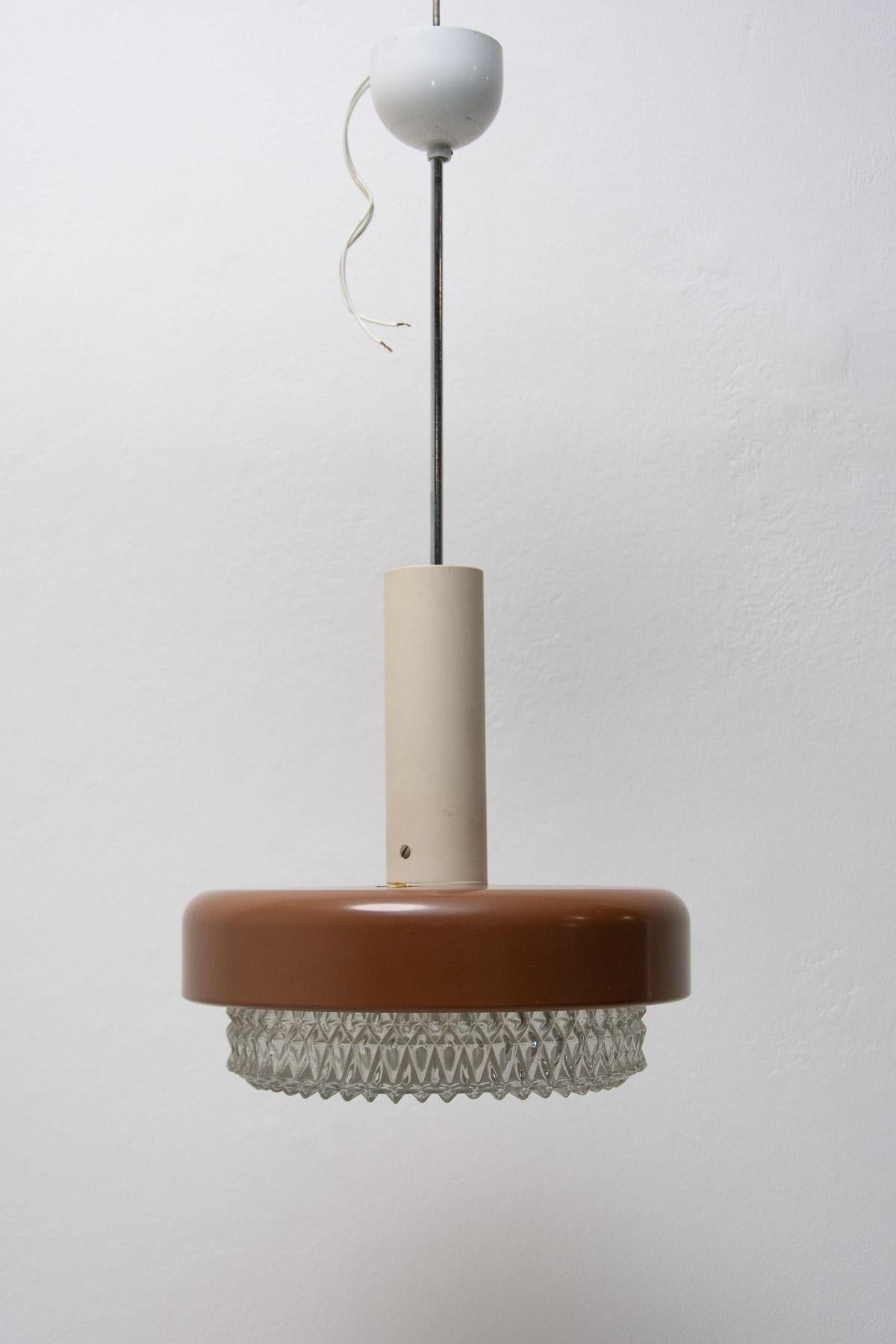 This mid century hanging lamp was made in the former Czechoslovakia in the 1970´s

It´s made of cut glass, plastic, metal, chrome. Very well preserved condition.

Fully functional. New wiring

Height with suspension: 63 cm

width: 39 cm

depth: 29