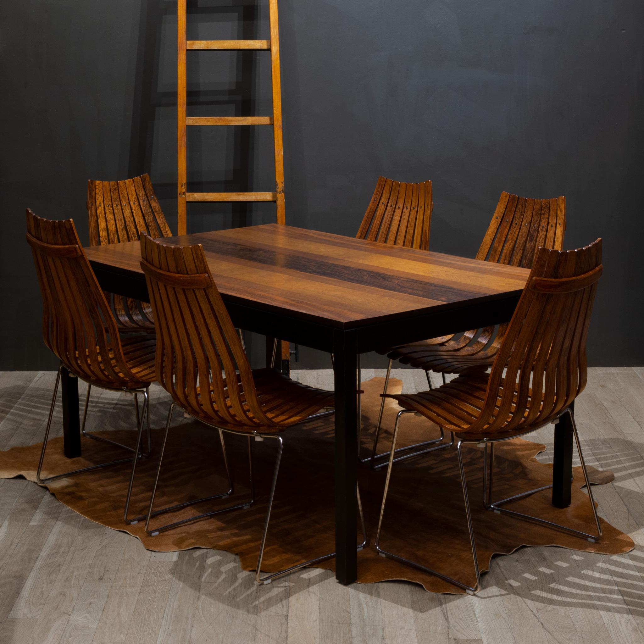 About

An original set of six stackable, mid-century high back, Rosewood dining chairs part of the “Scandia” series, designed by Hans Brattrud for Hove Møbler, Norway, circa 1957. Bent rosewood slats form the backs and seats of the chairs. The