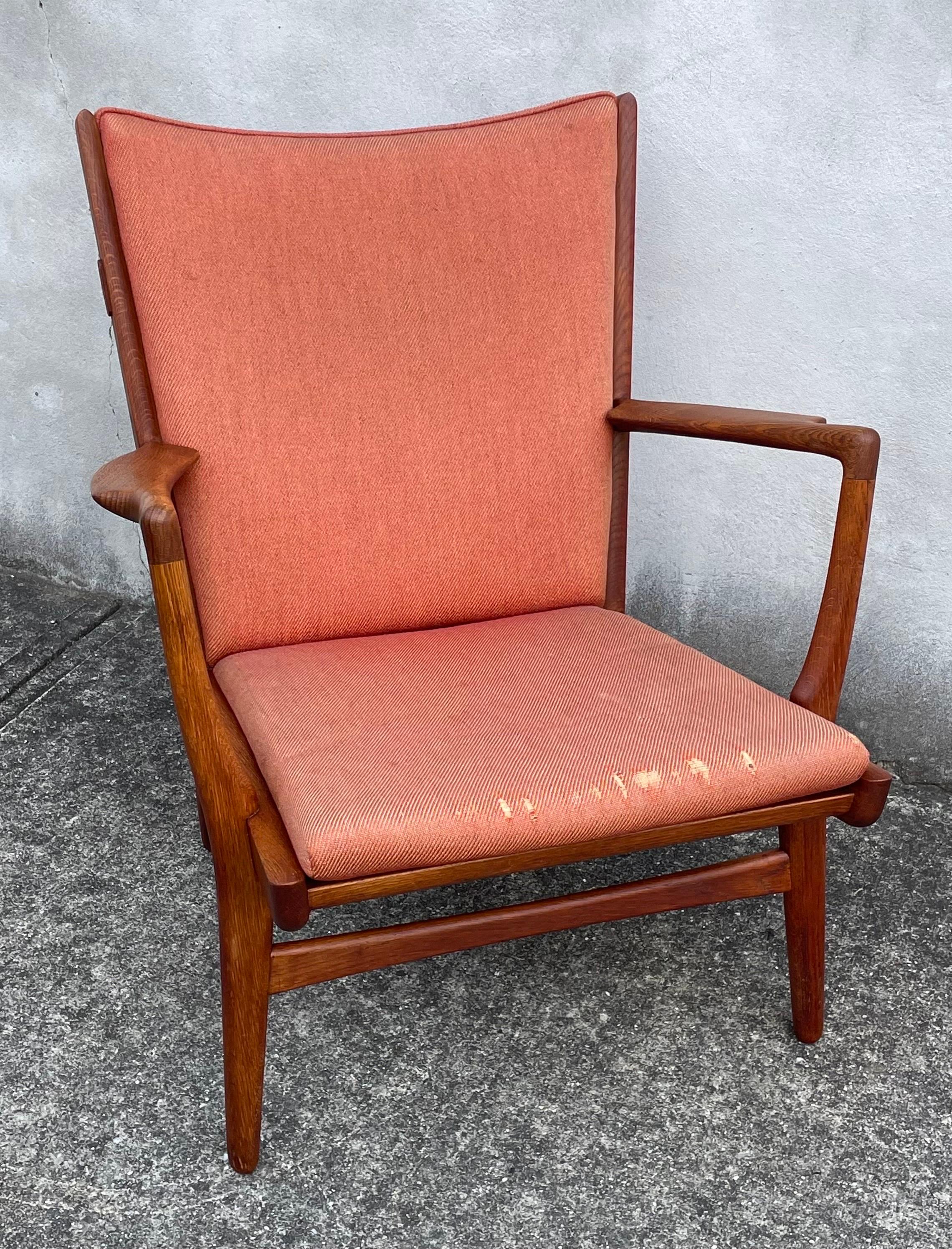 Beautiful Hans J. Wegner AP16 lounge chair in original vintage condition.  Teak frame has been professionally cleaned and oiled.  Original upholstery with wear due to age and use.