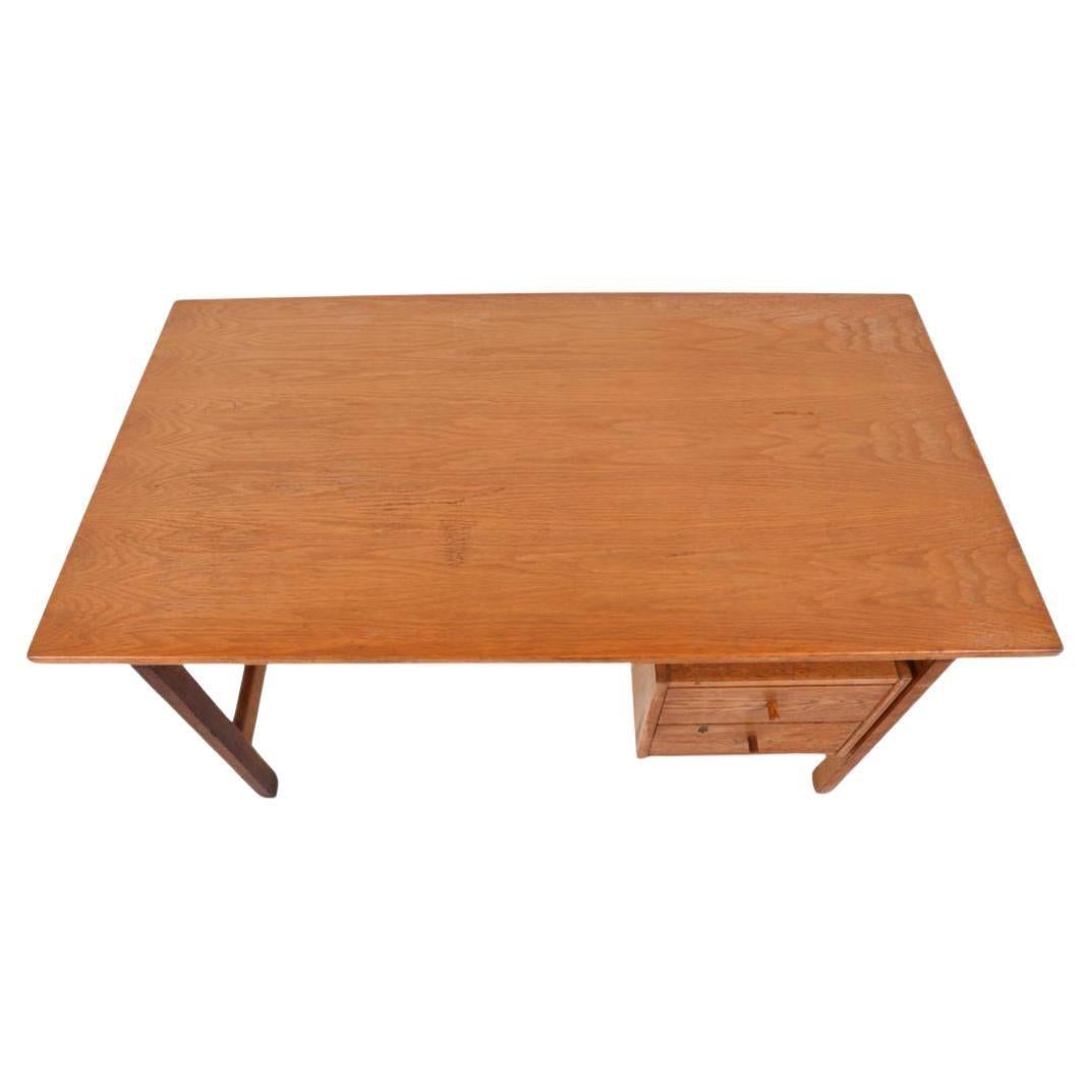 Vintage 1960s Danish solid white oak desk Model 156 with (2) drawers designed by Hans J. Wegner for GETAMA Manufacturer. The Solid Oak desk with Brass key lock with key on (1) drawer. (2) lower drawers with oak pulls in front on back side is a